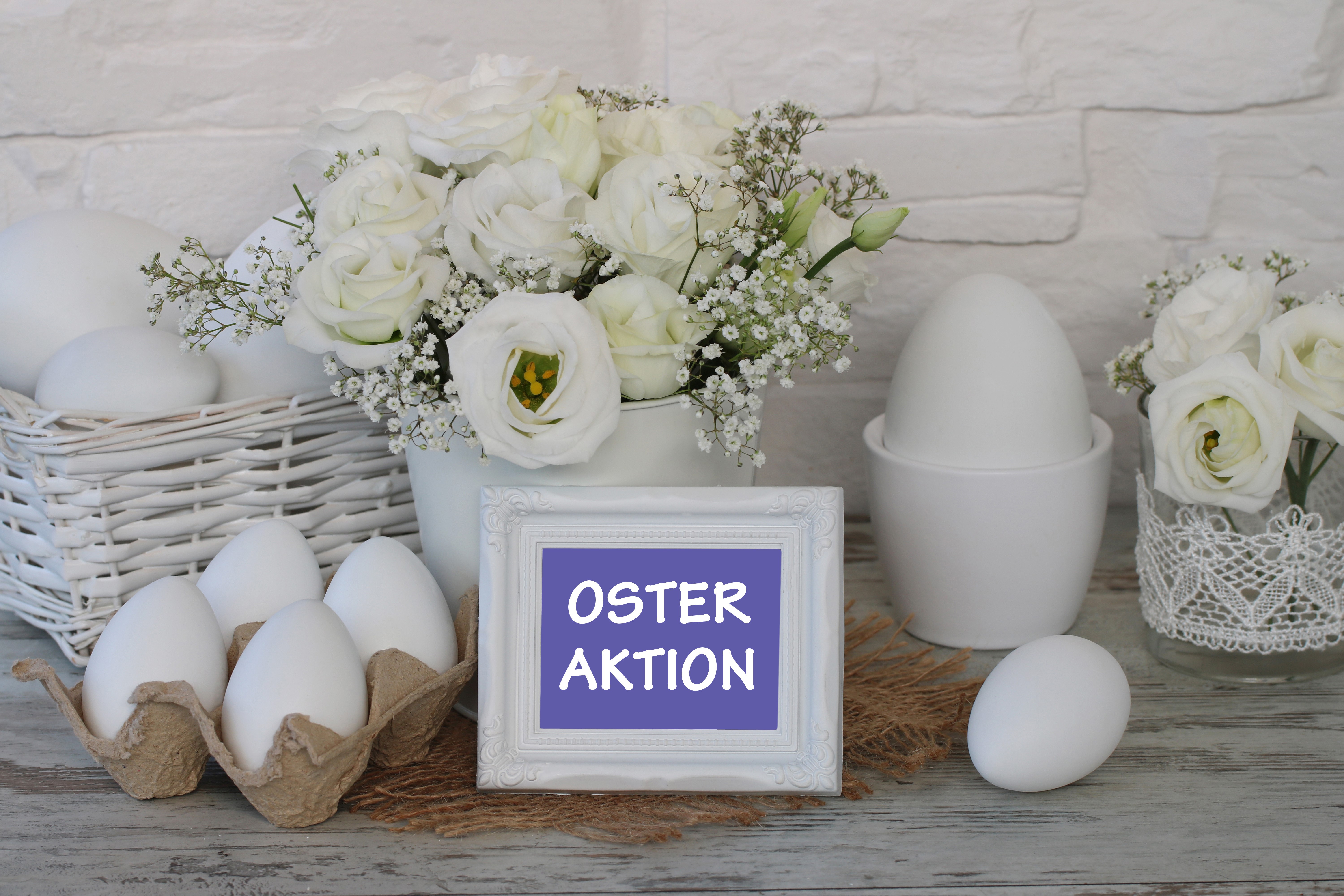 Easter Eggs and White Eustoma Flowers with German Text HD Wallpaper