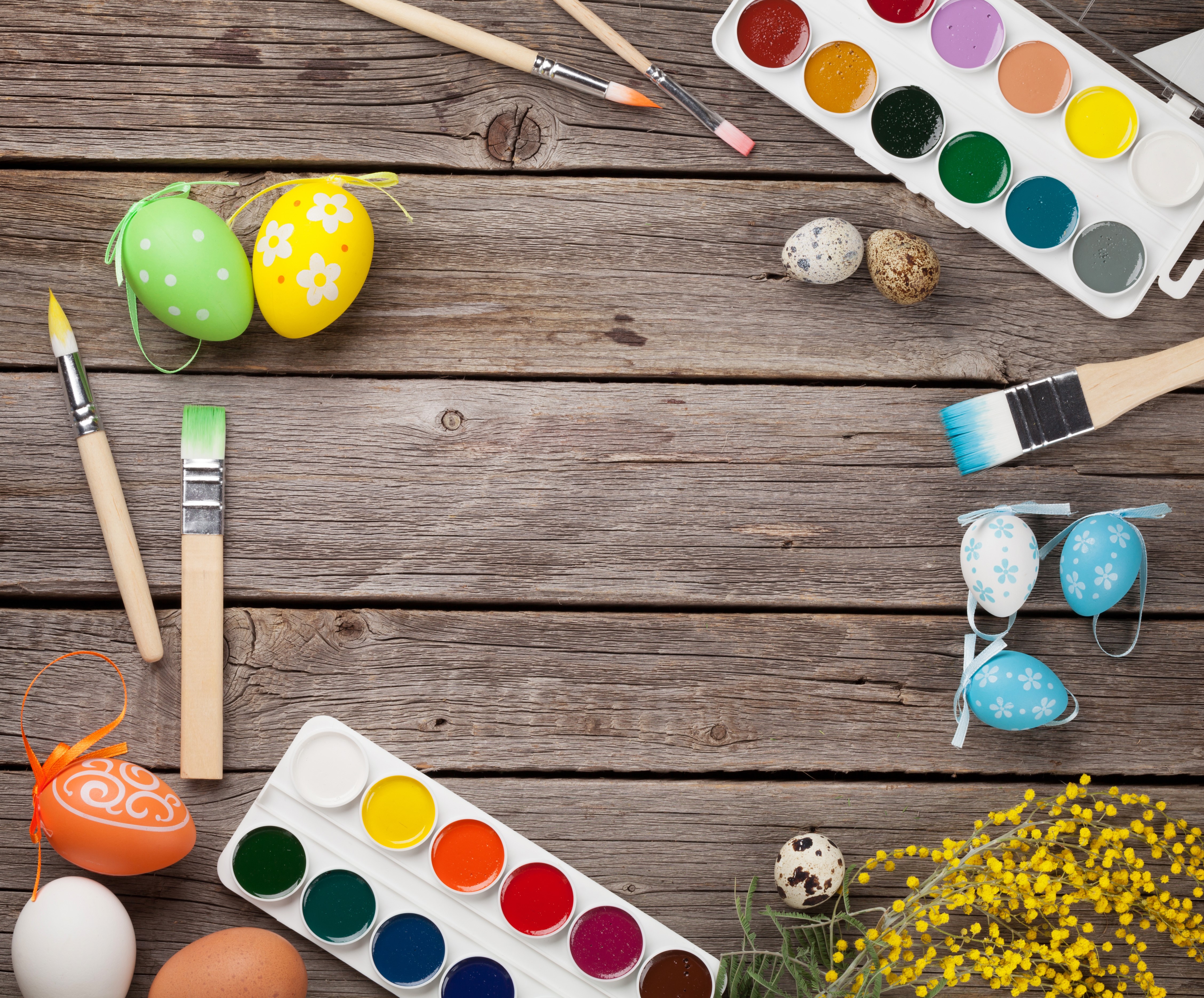 Easter eggs and painting supplies on wood HD Wallpaper