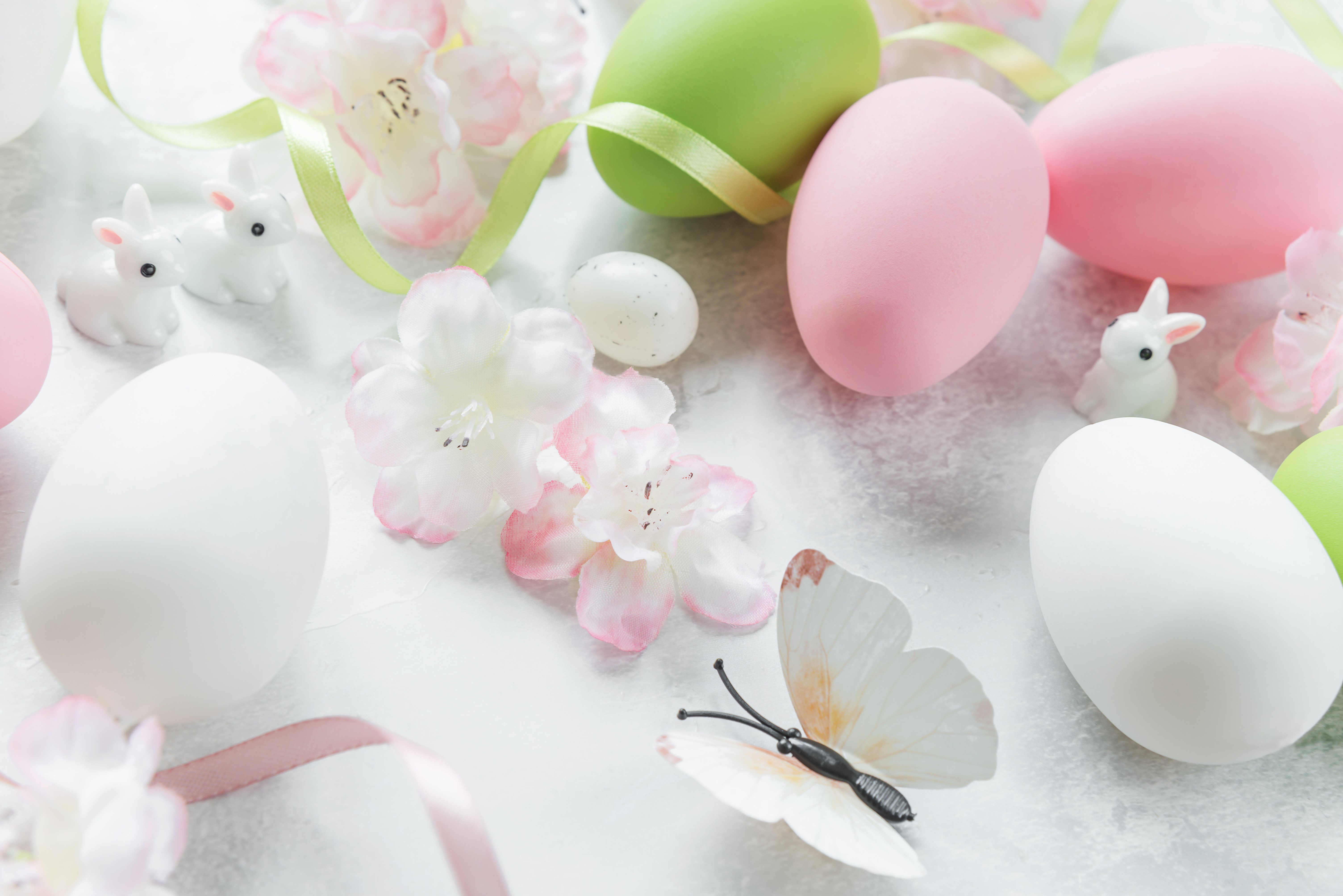 Easter eggs, bunnies, flowers, and butterfly decorations HD Wallpaper