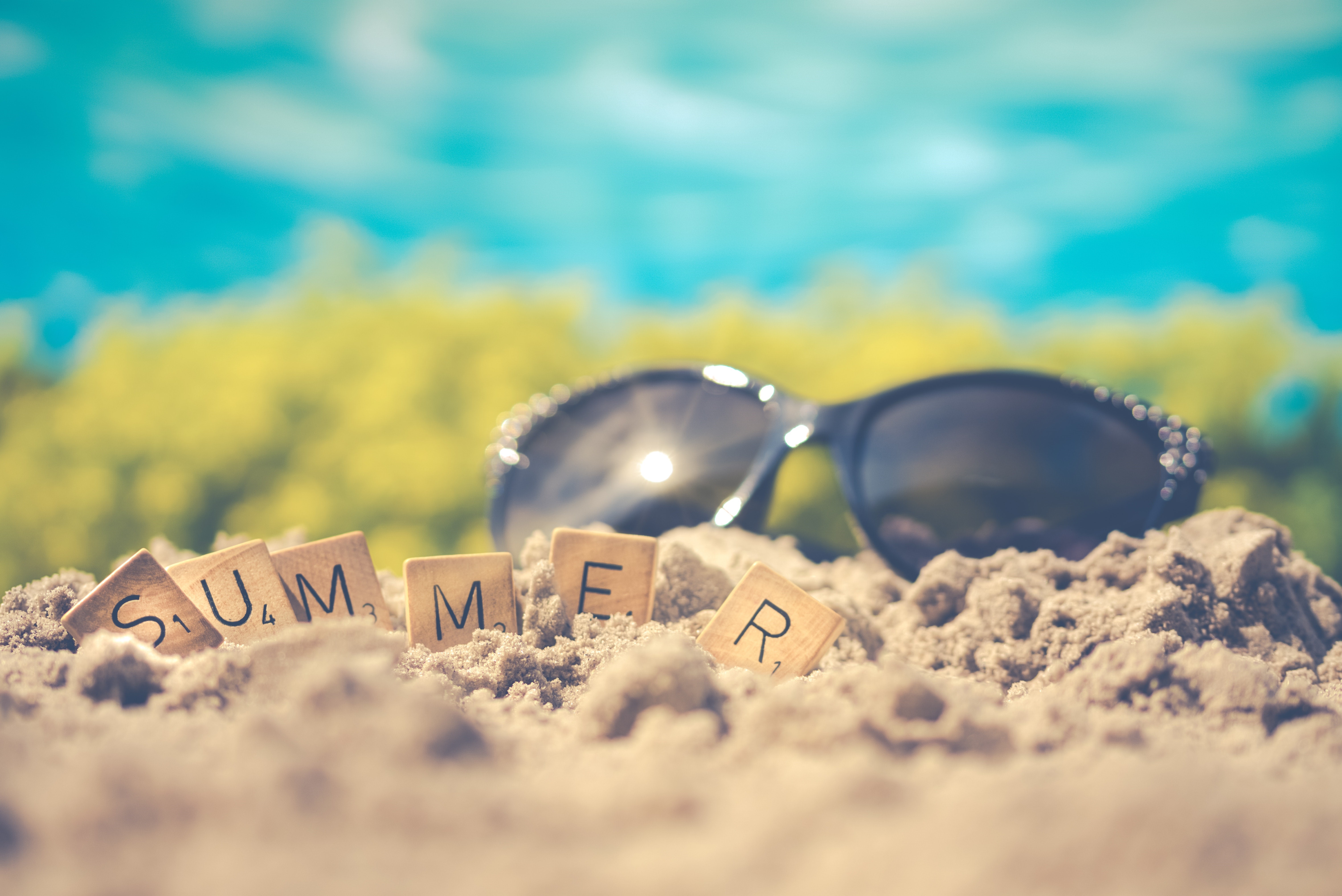 Summer word on sand with sunglasses HD Wallpaper