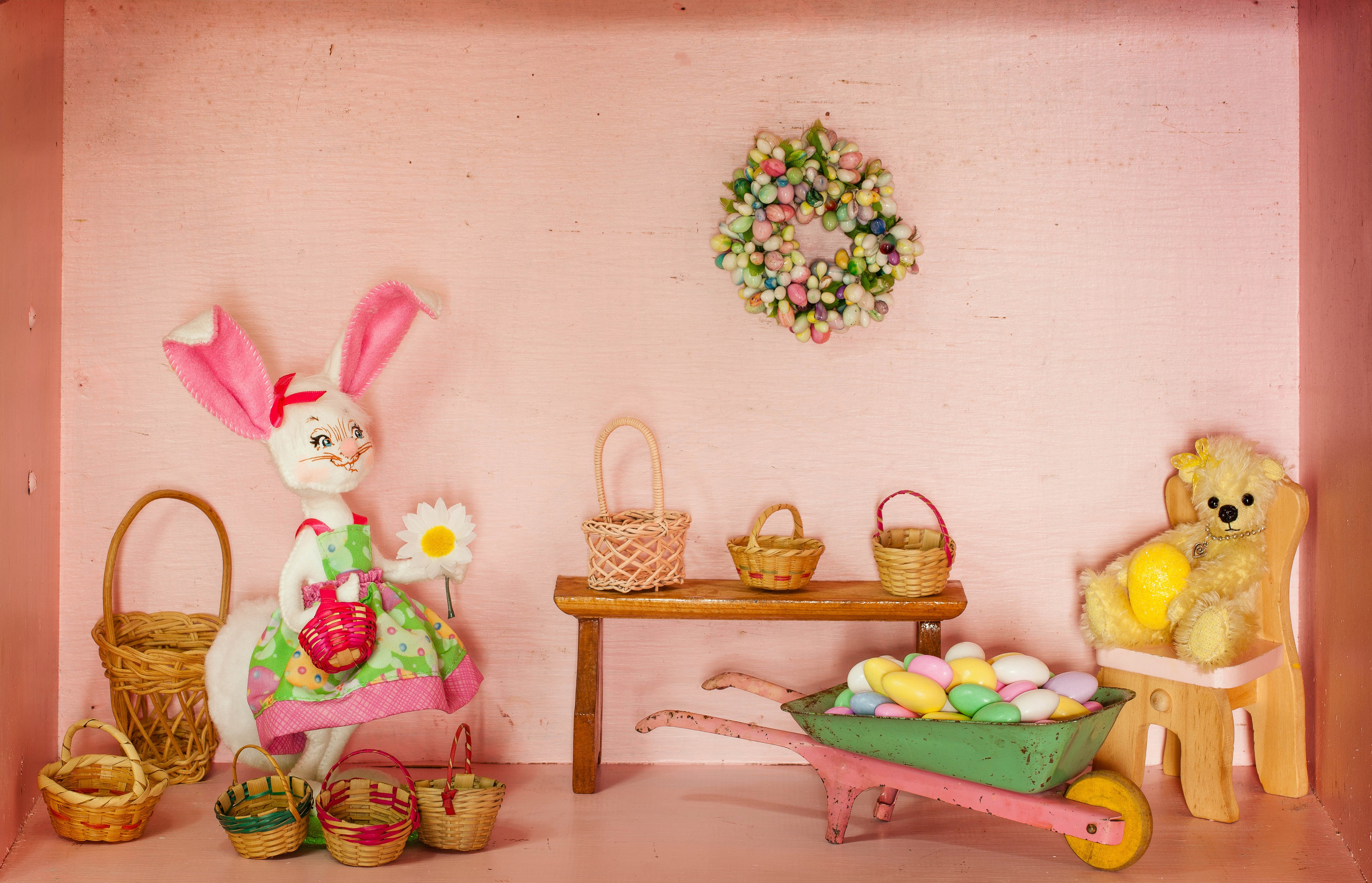 Easter scene with bunny, teddy bear, baskets, and eggs HD Wallpaper