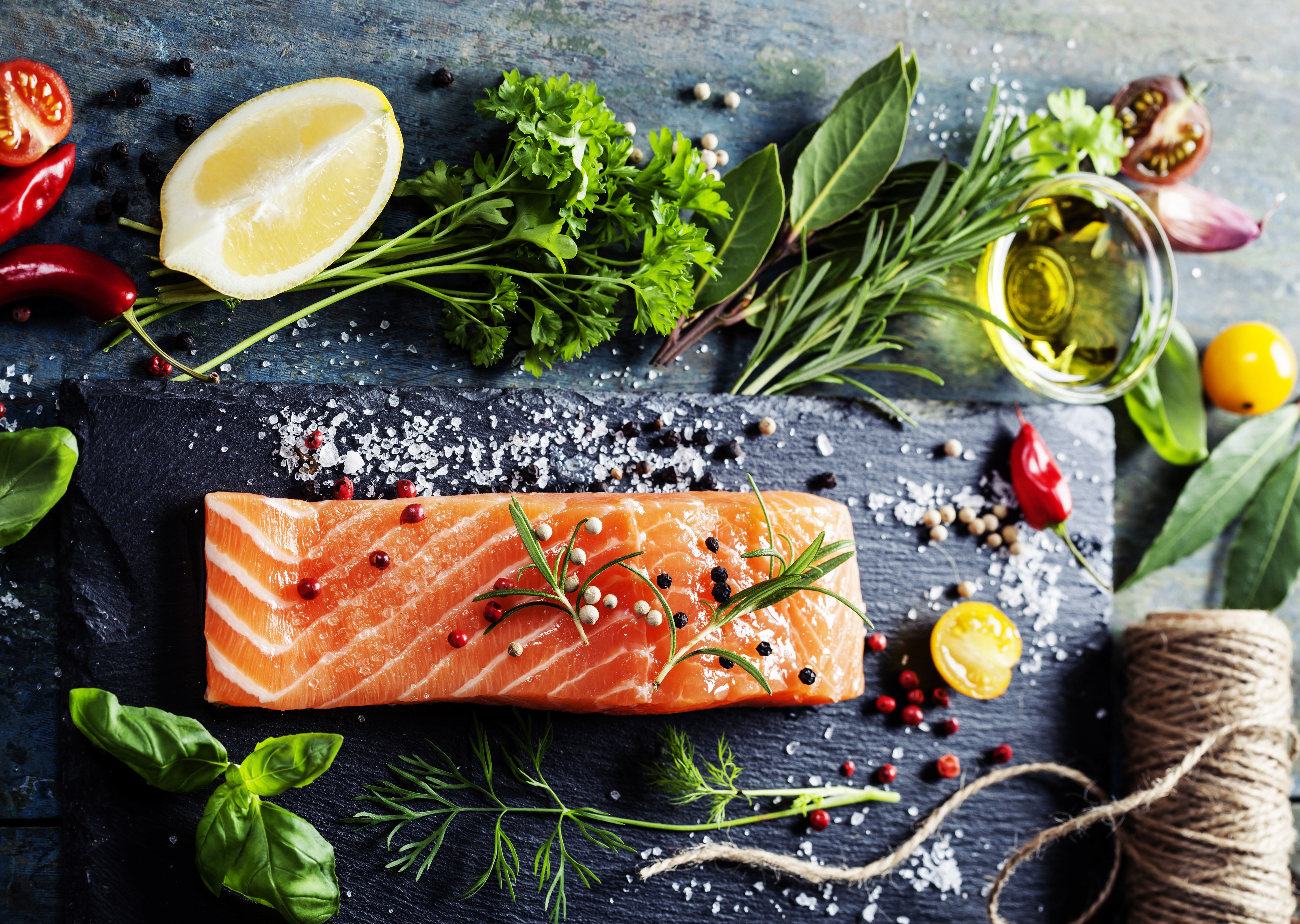 Salmon fillet with herbs, lemon, and spices HD Wallpaper