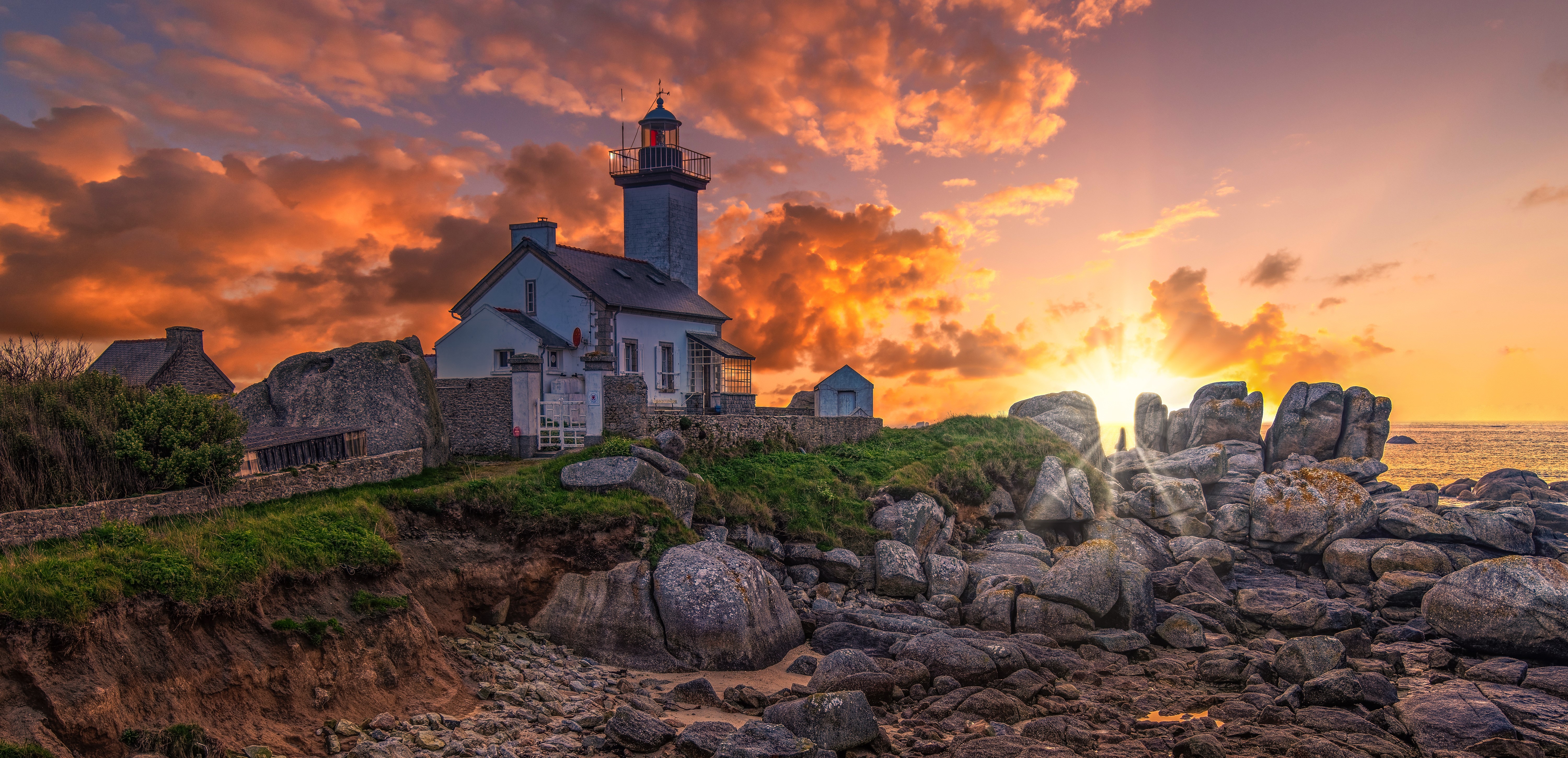 Lighthouse of Pontusval, France at Sunset HD Wallpaper