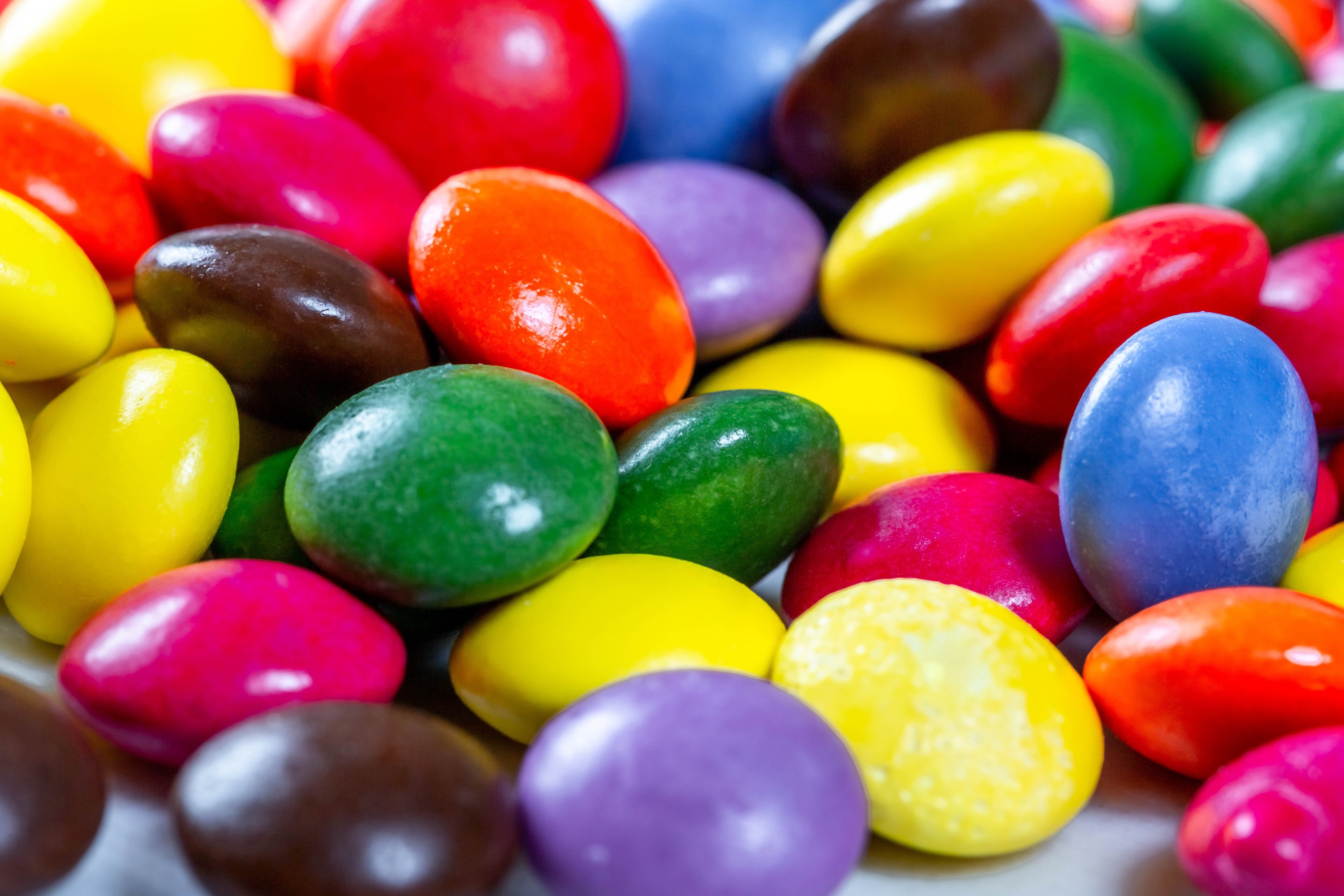 Close-up of colorful dragees HD Wallpaper