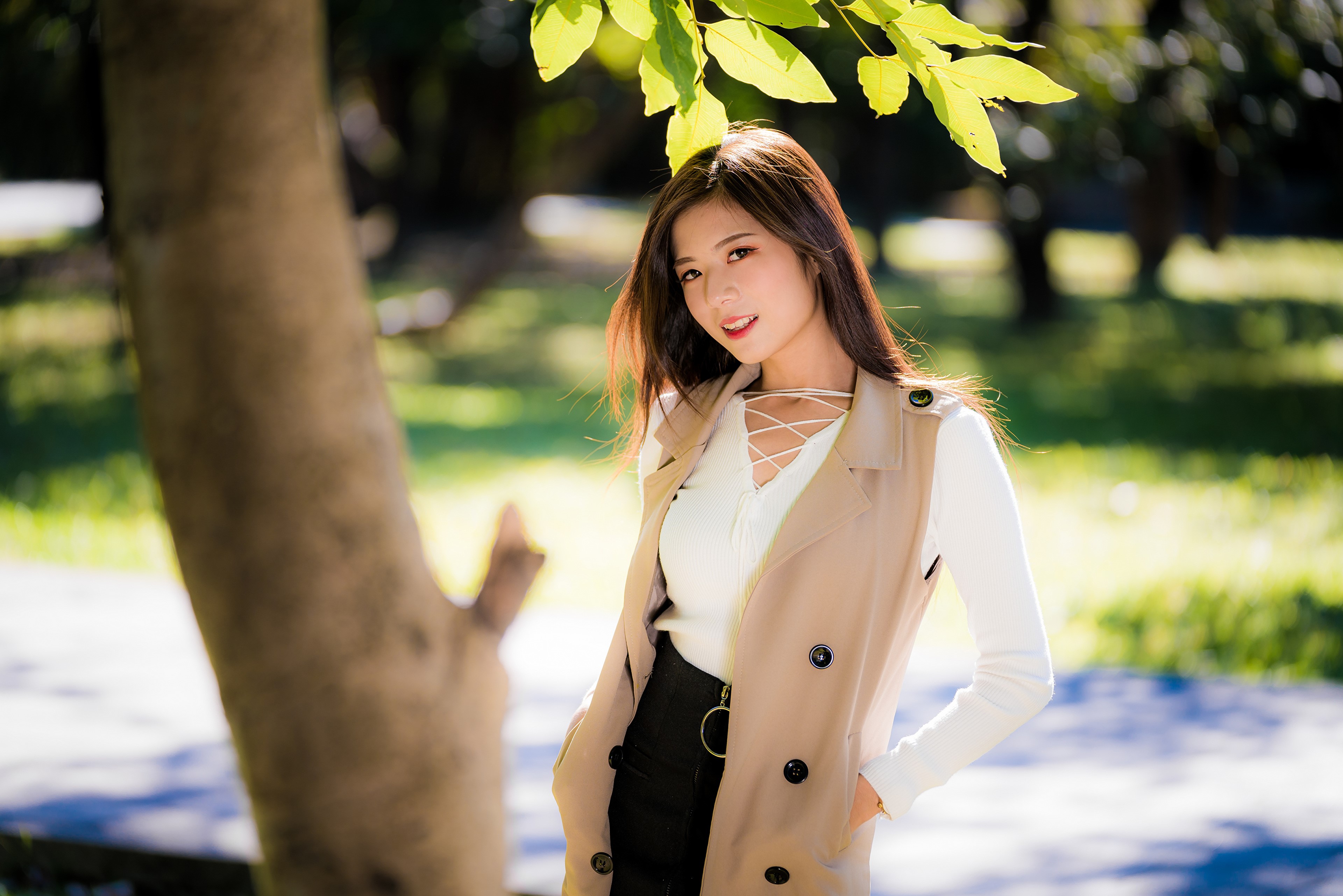 4K Asian Woman with Brown Hair in Sunlight HD Wallpaper