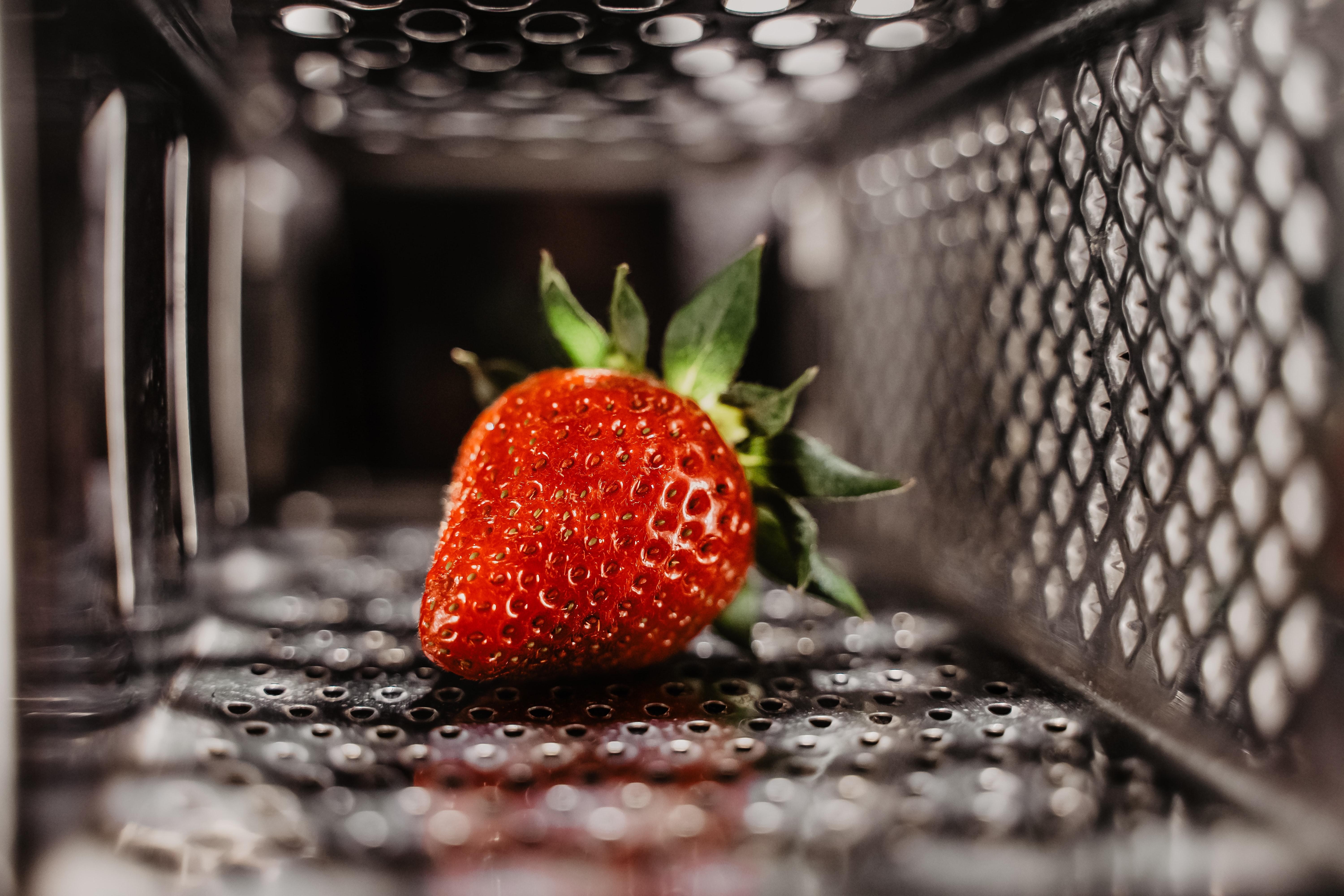 Strawberry inside a grater HD Wallpaper