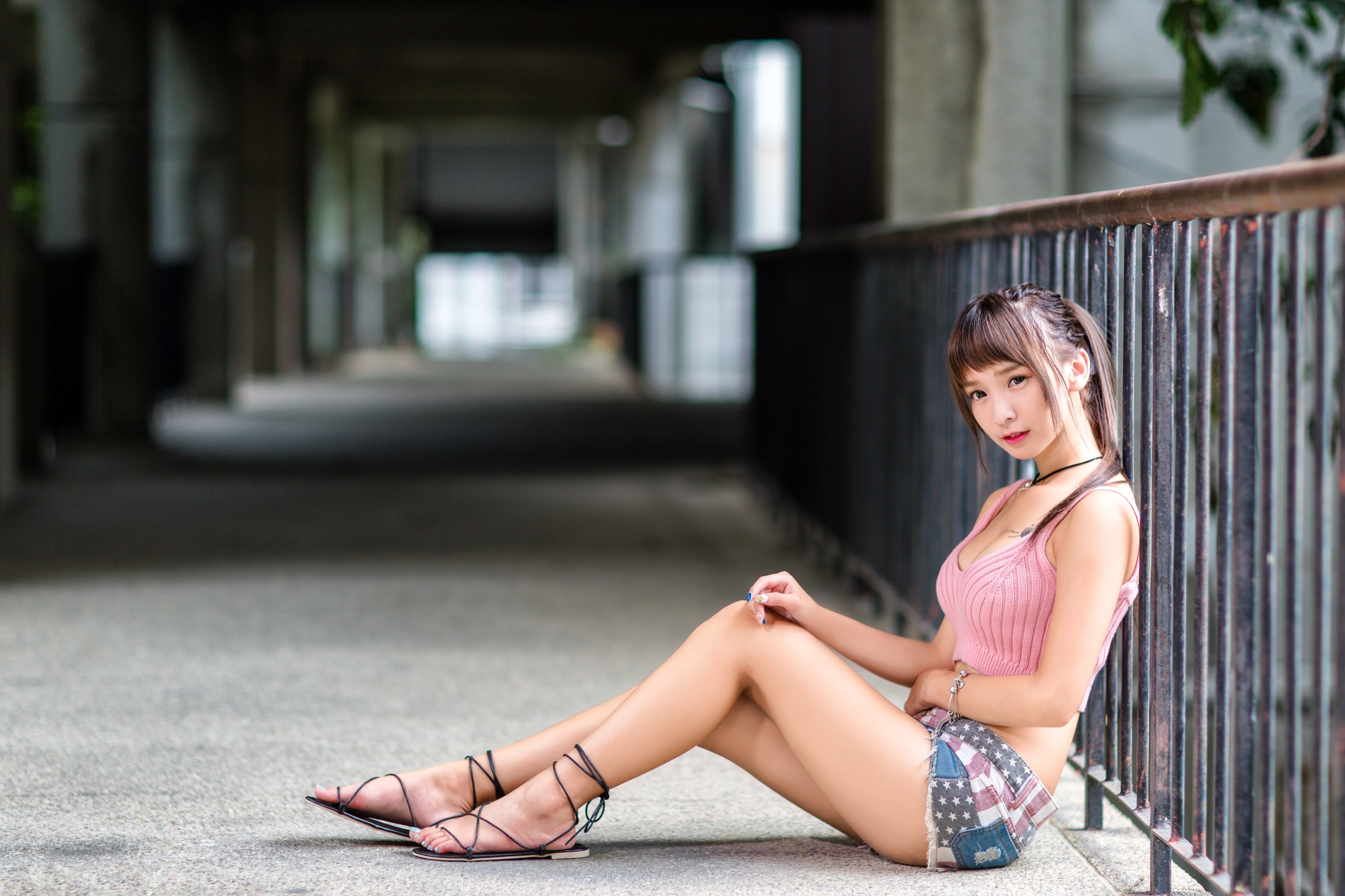 4K Asian Woman Sitting Beside Fence HD Wallpaper