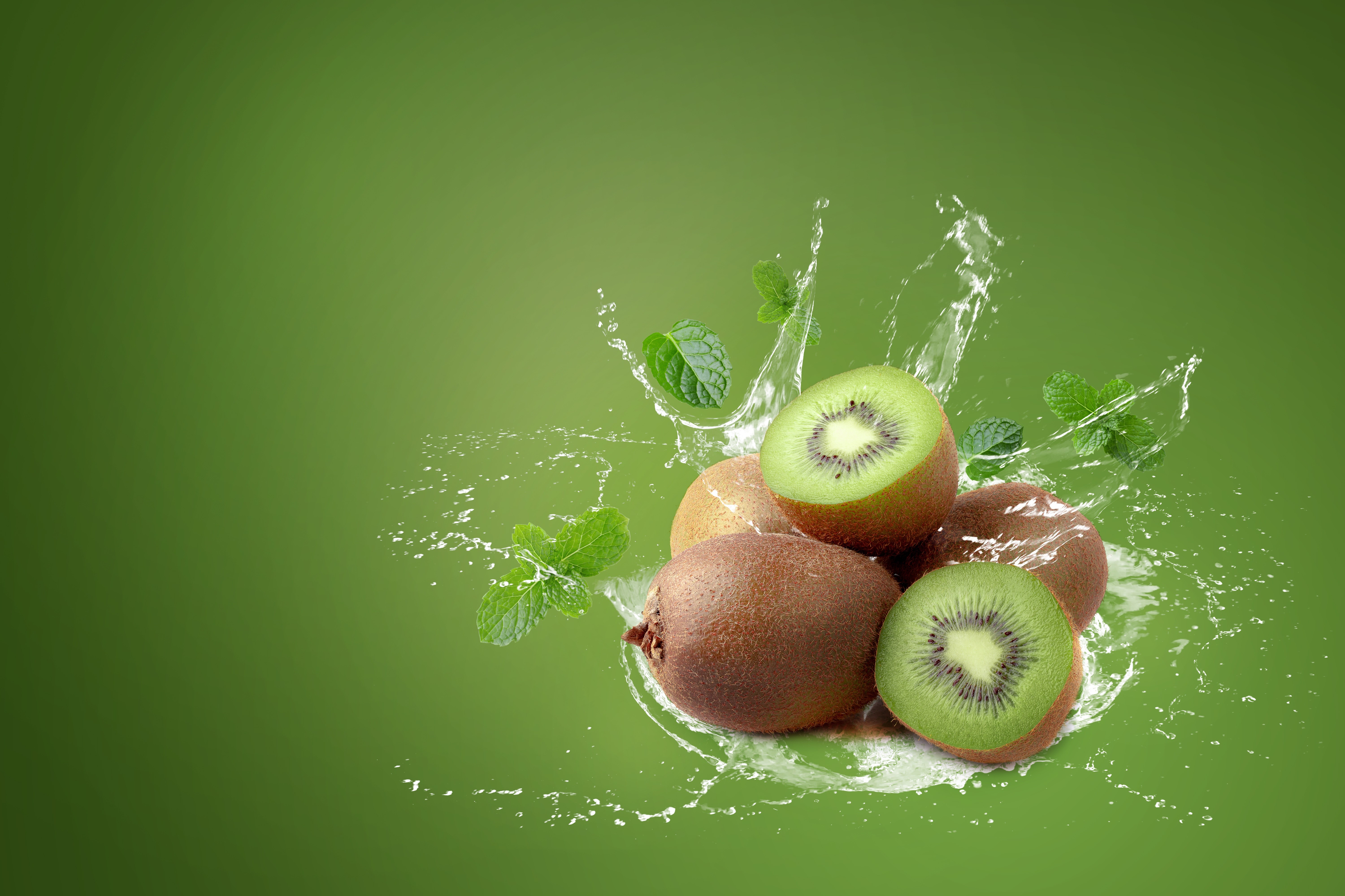 Kiwi fruit with mint and water splash HD Wallpaper