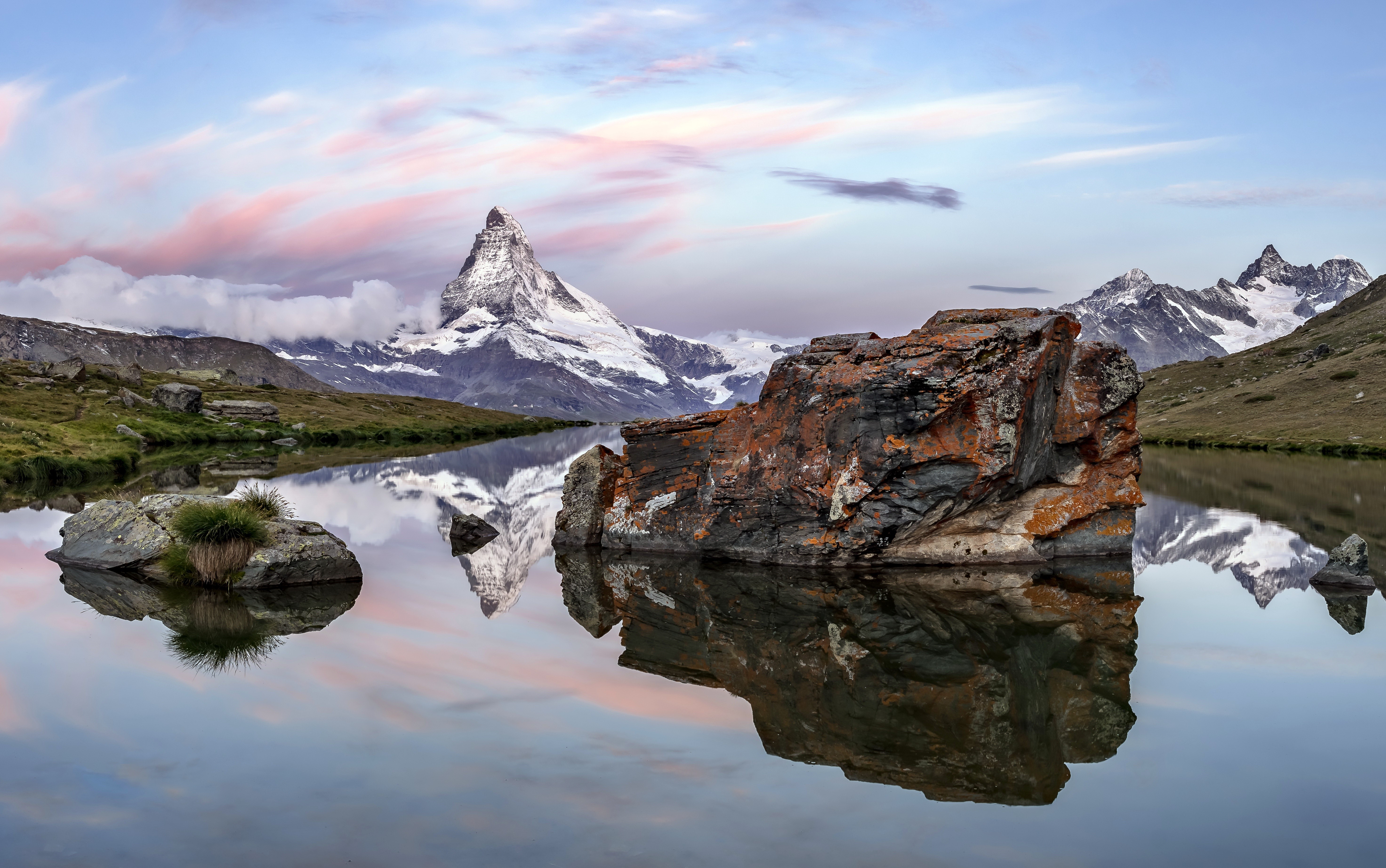 Matterhorn mountain reflected in a lake, Zermatt, Switzerland HD Wallpaper