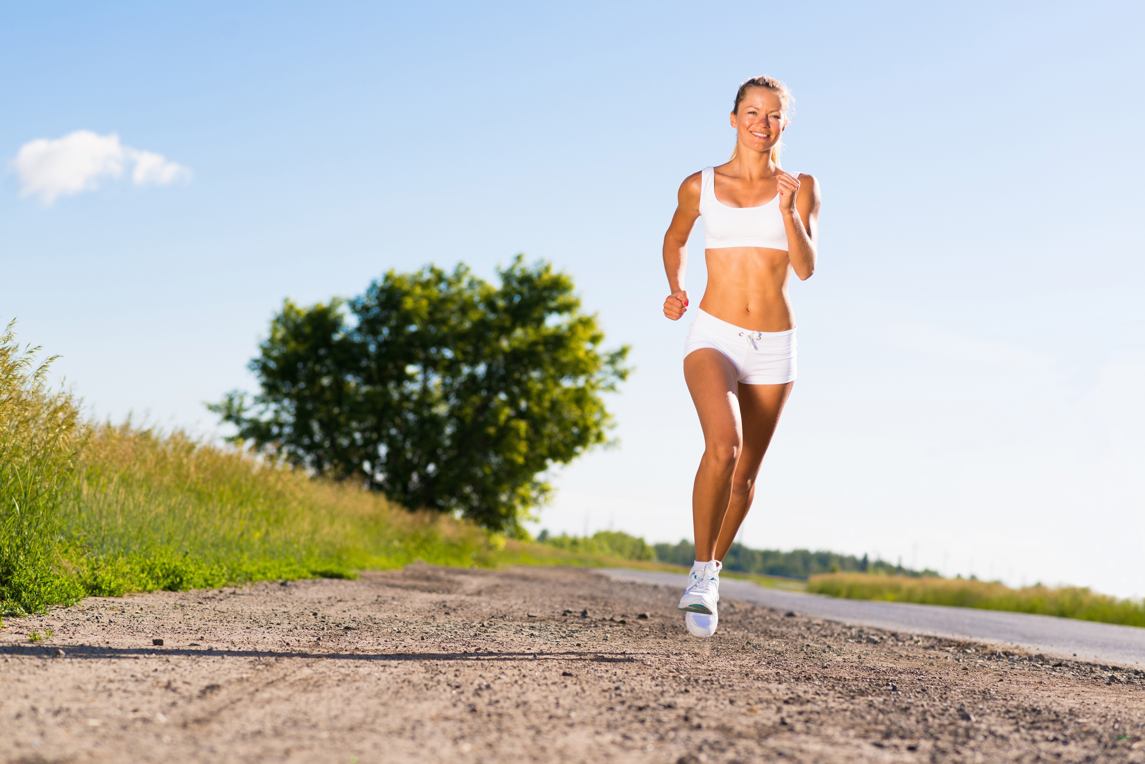 Fitness Woman Running on Country Road HD Wallpaper
