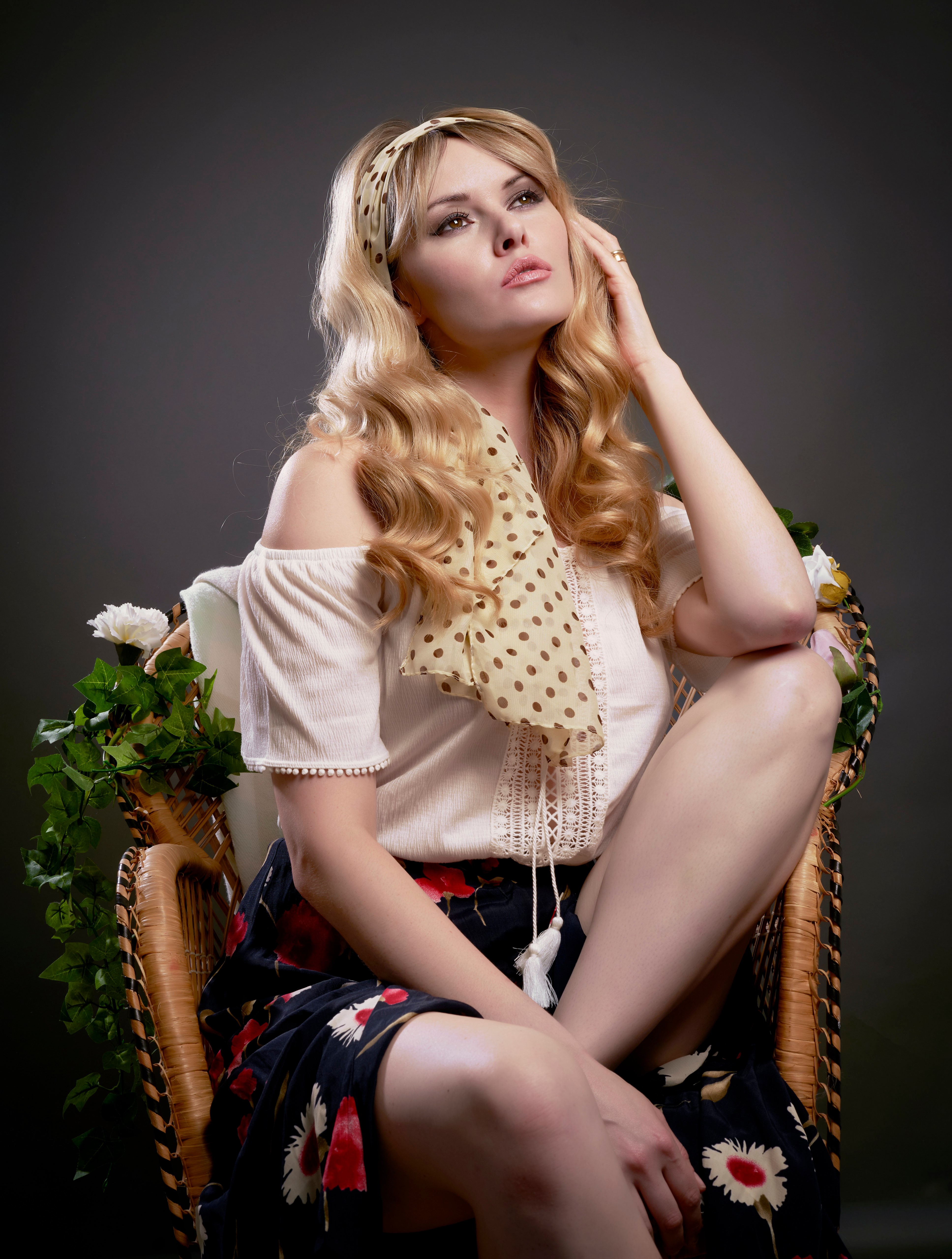 Blonde girl sitting in an armchair HD Phone Wallpaper