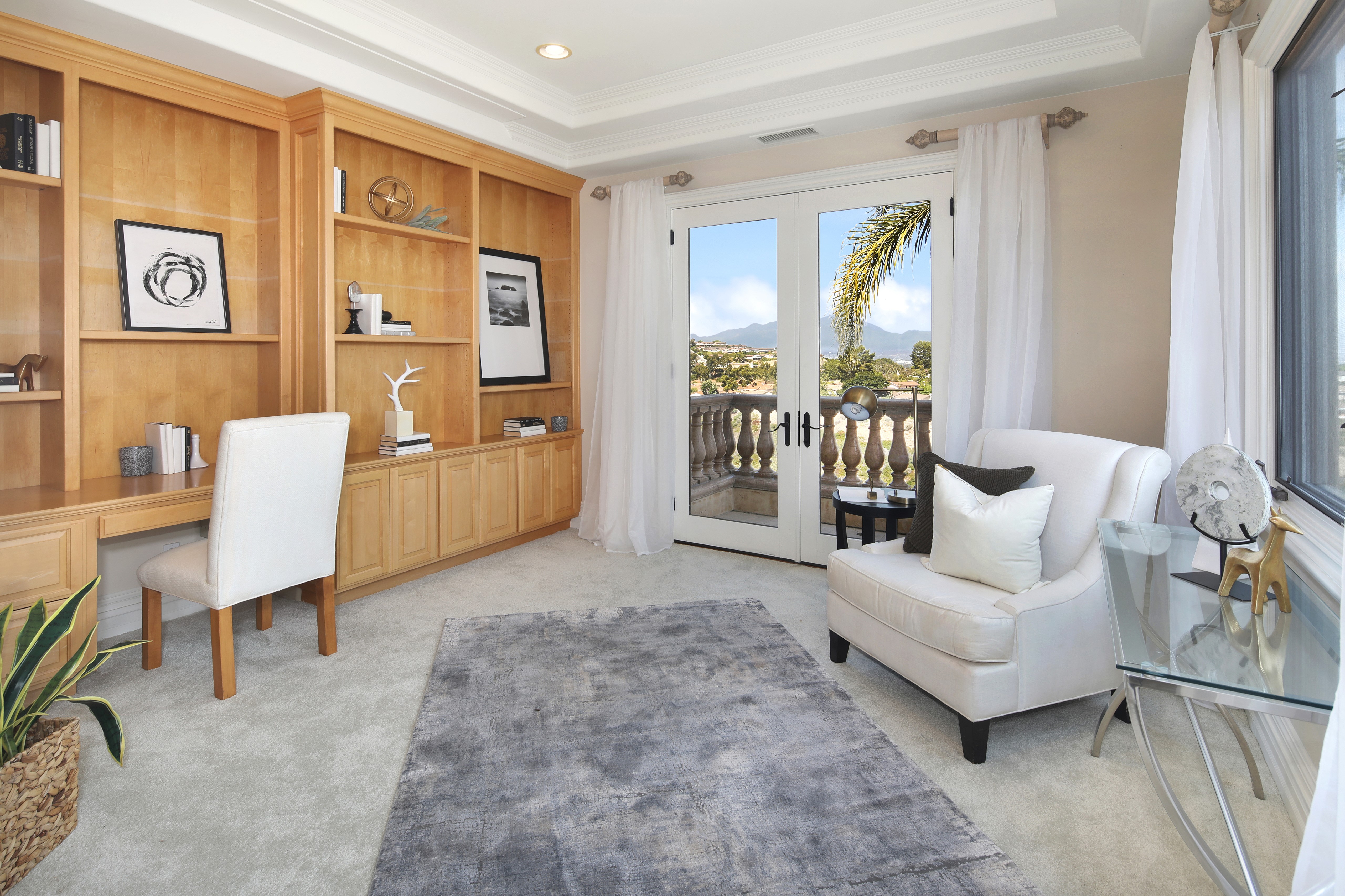 Interior design with armchair, desk, and balcony view HD Wallpaper