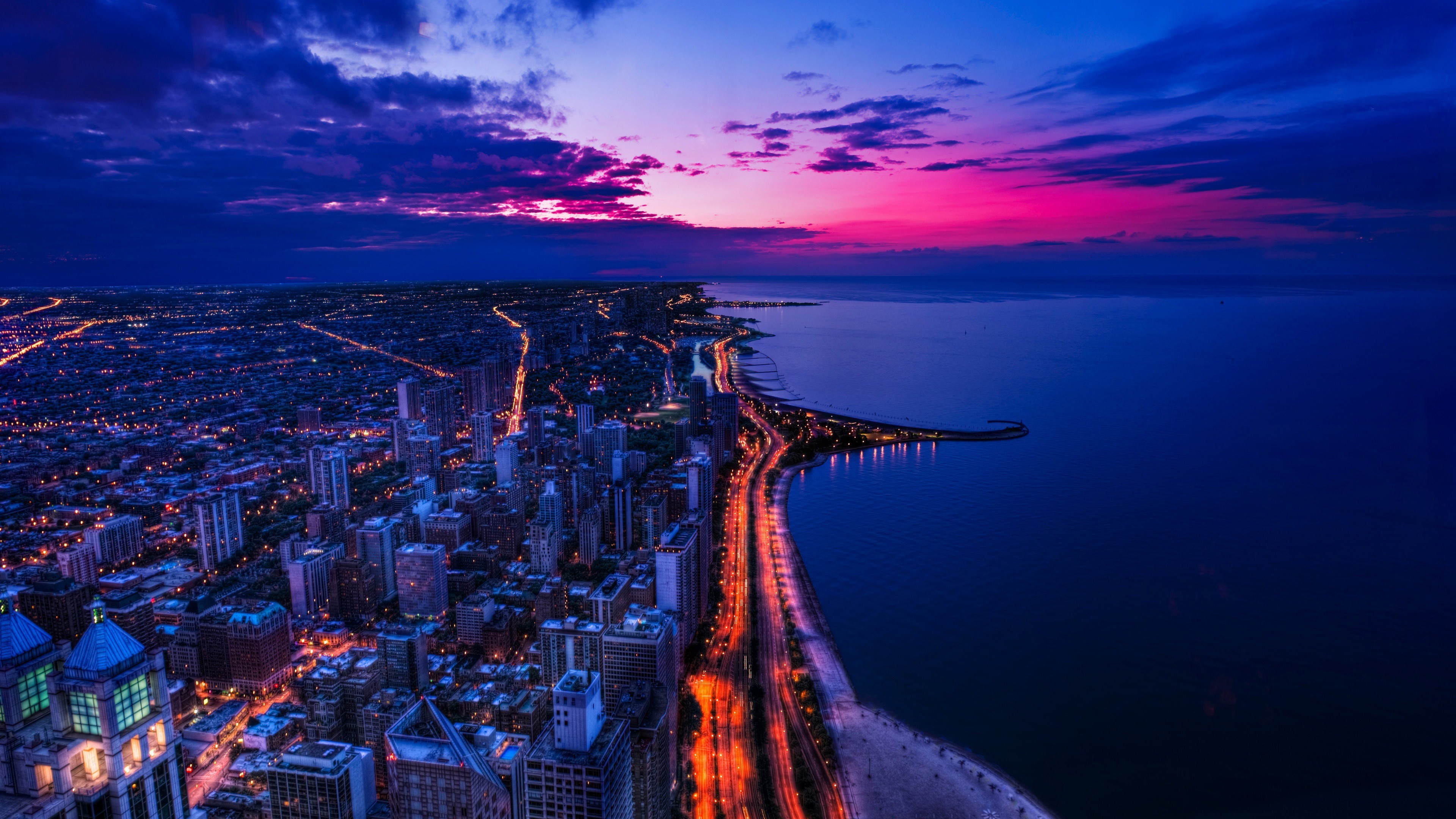 Aerial view of Chicago skyline at dusk with Lake Michigan HD Wallpaper