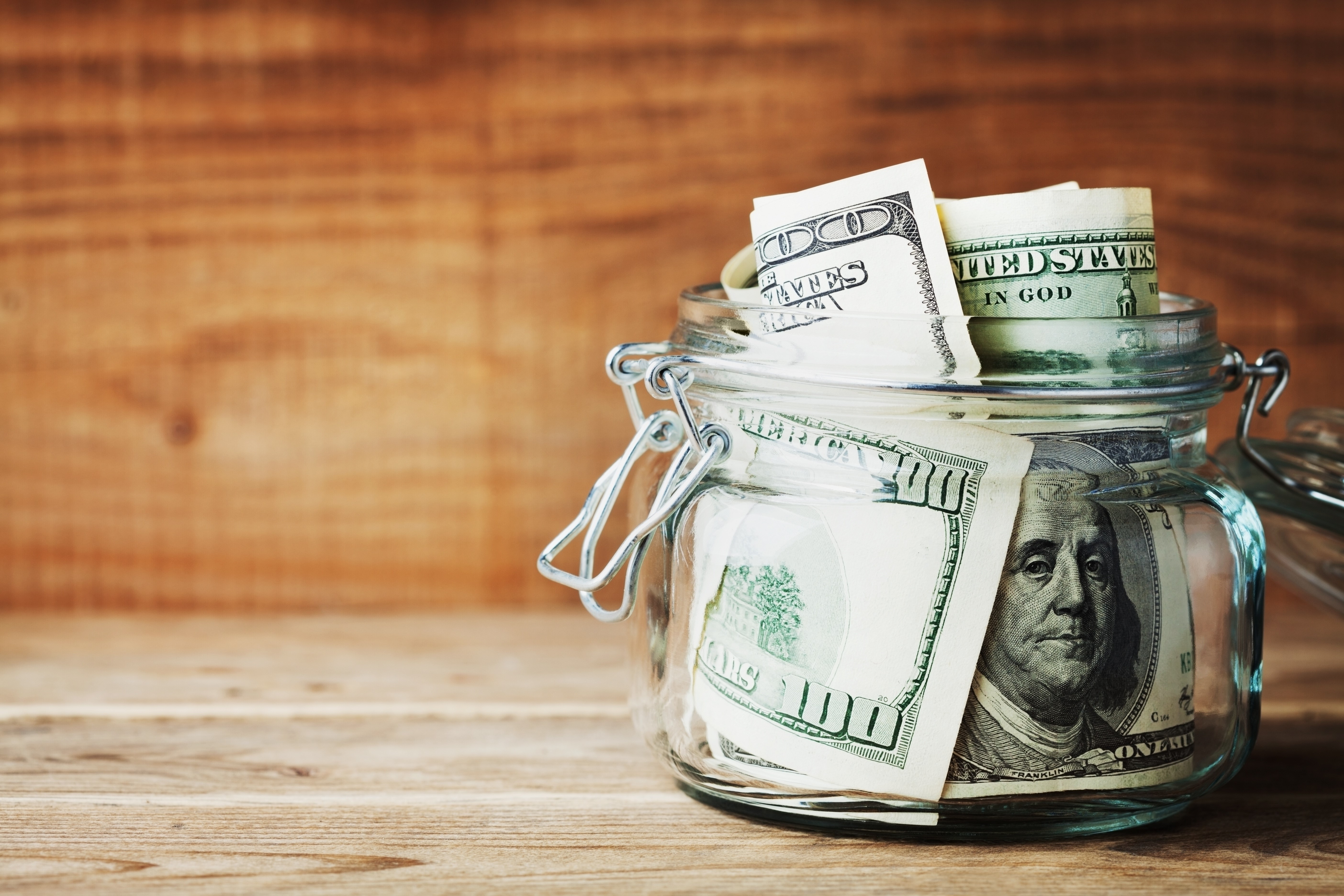 US Dollars in a Glass Jar HD Wallpaper