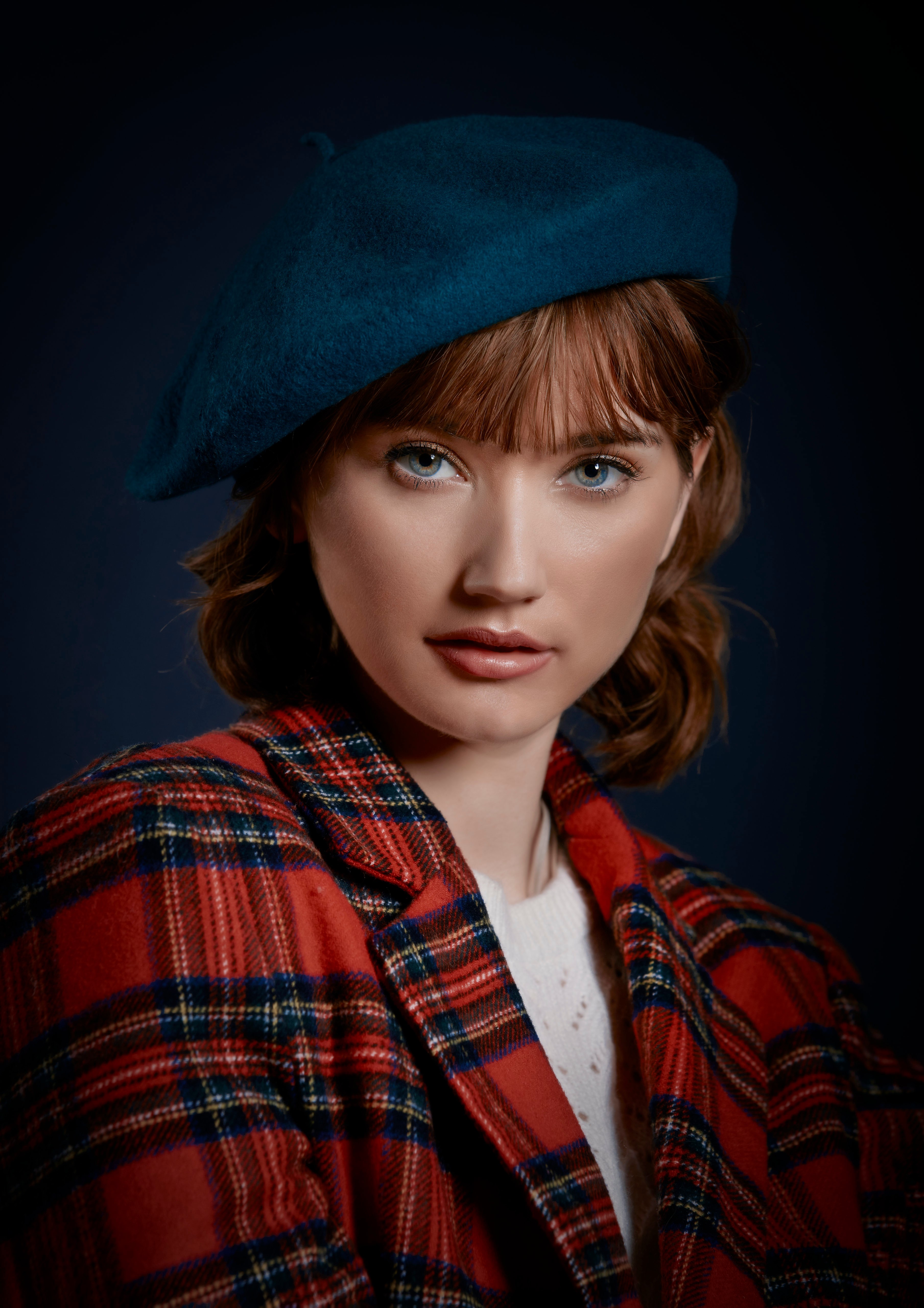 Woman wearing a blue beret and plaid jacket HD Phone Wallpaper