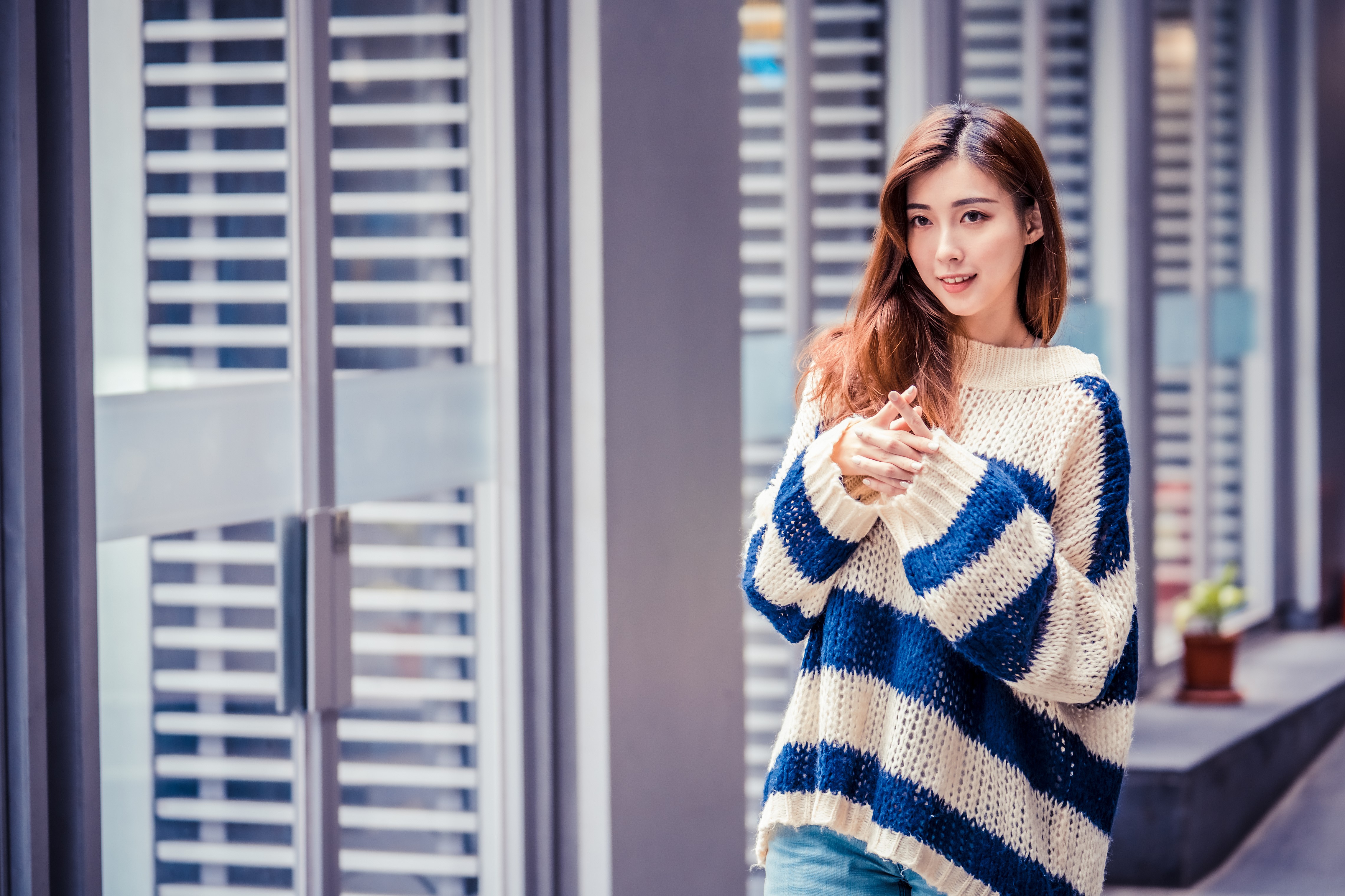 Asian woman in striped sweater HD Wallpaper