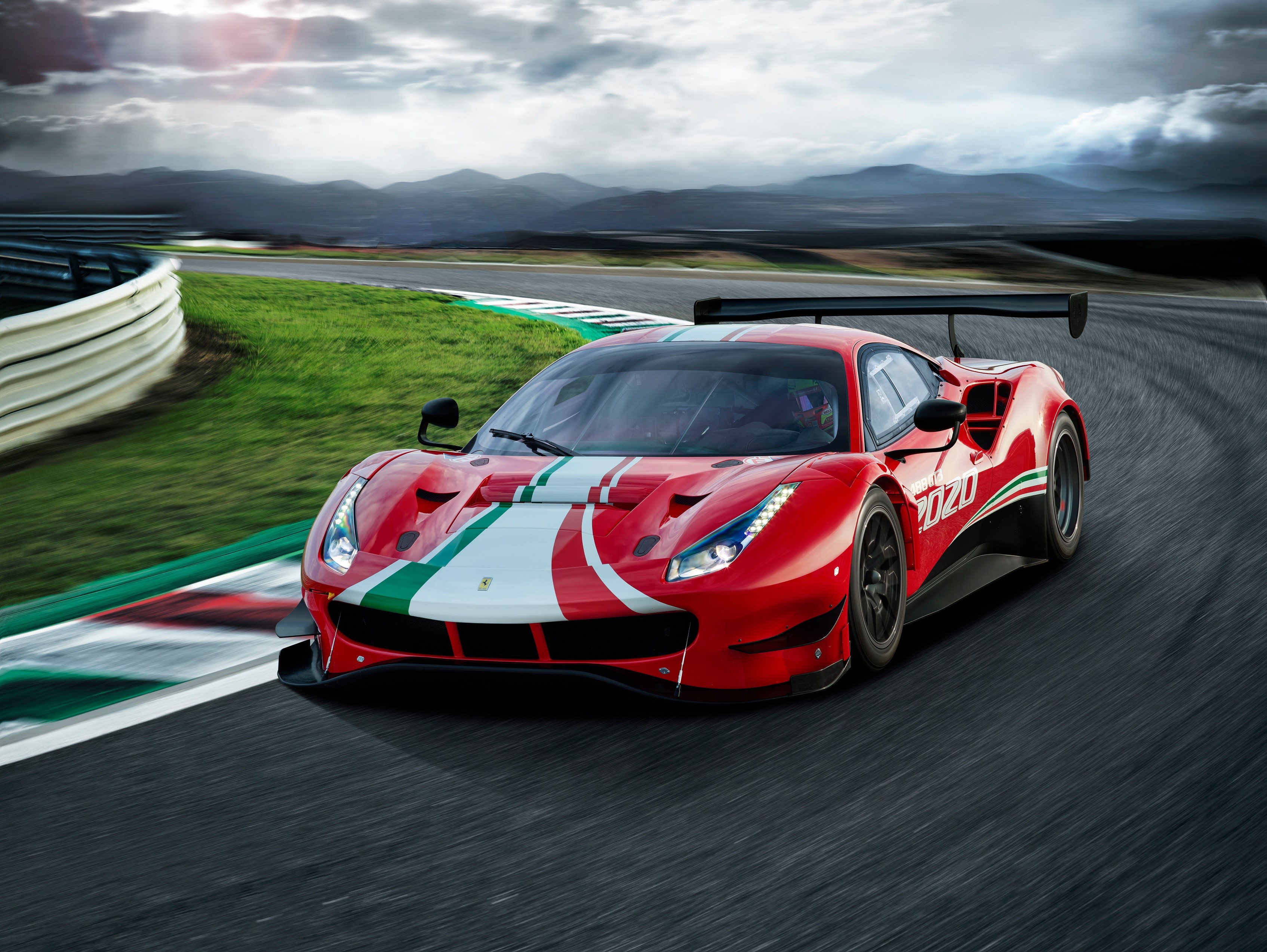 Ferrari 488 GT3 Evo on a race track HD Wallpaper