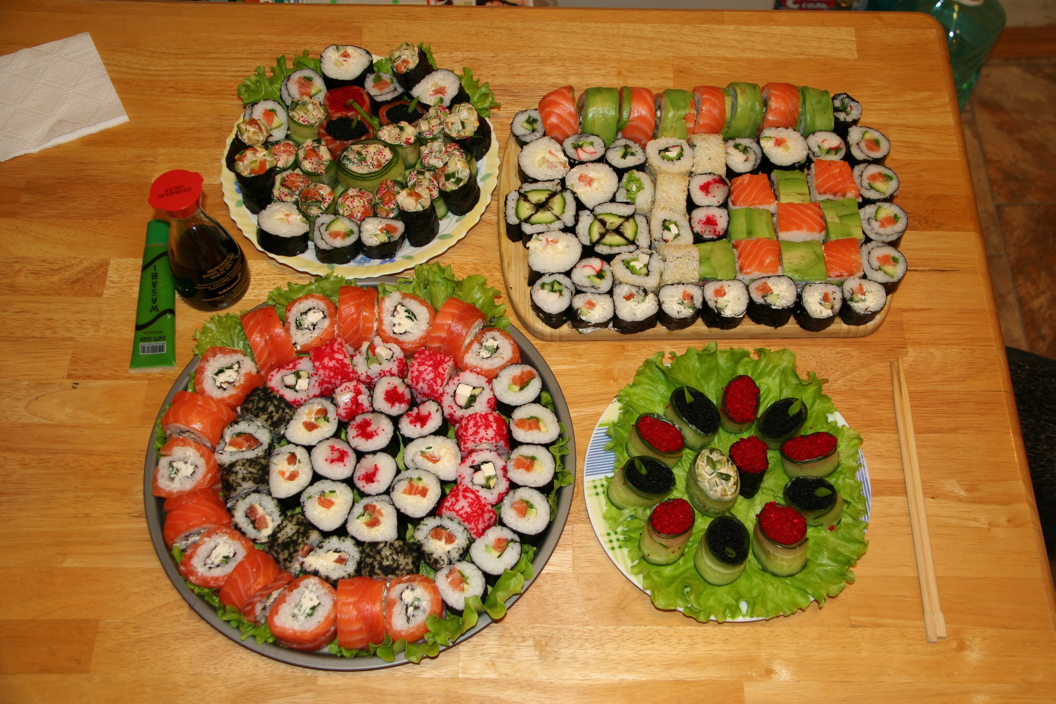 Assortment of Sushi and Caviar Dishes HD Wallpaper
