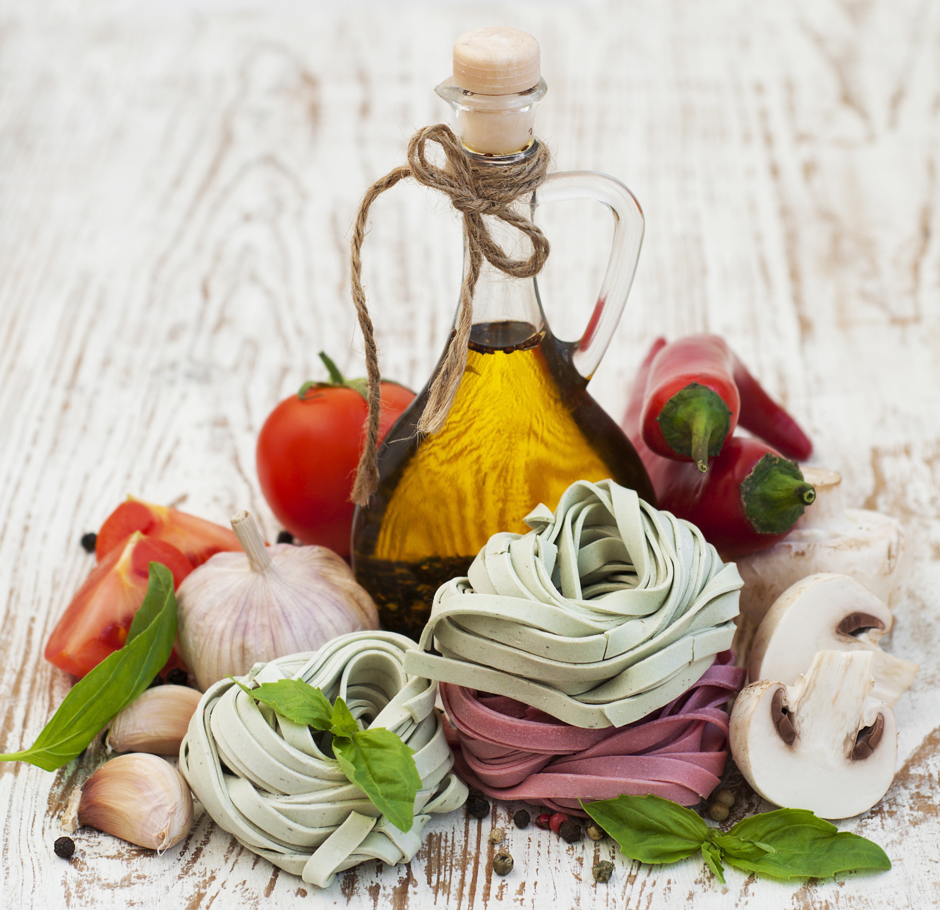 Pasta ingredients with olive oil bottle HD Wallpaper