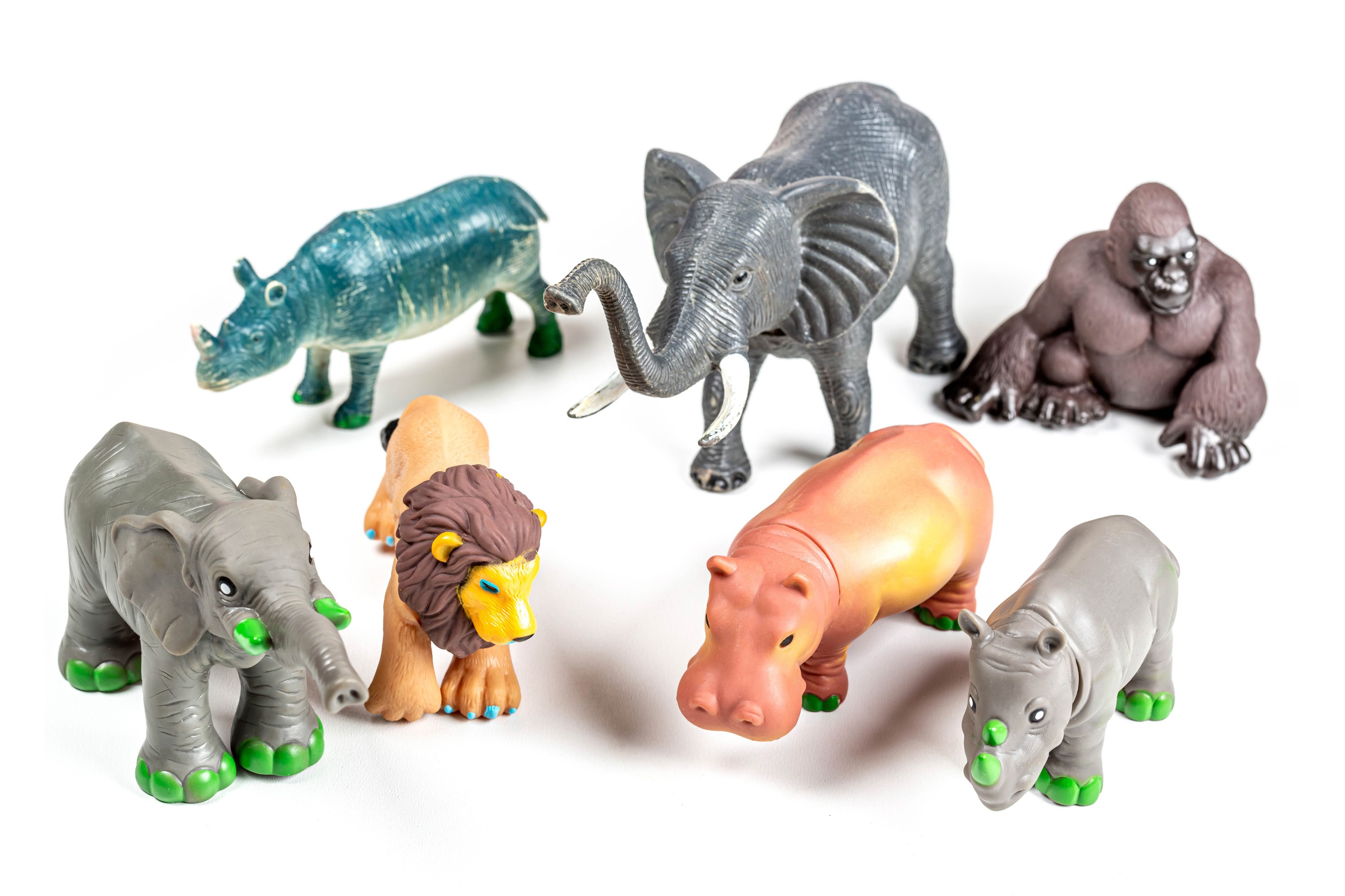 Collection of toy safari animals on a white background HD Wallpaper