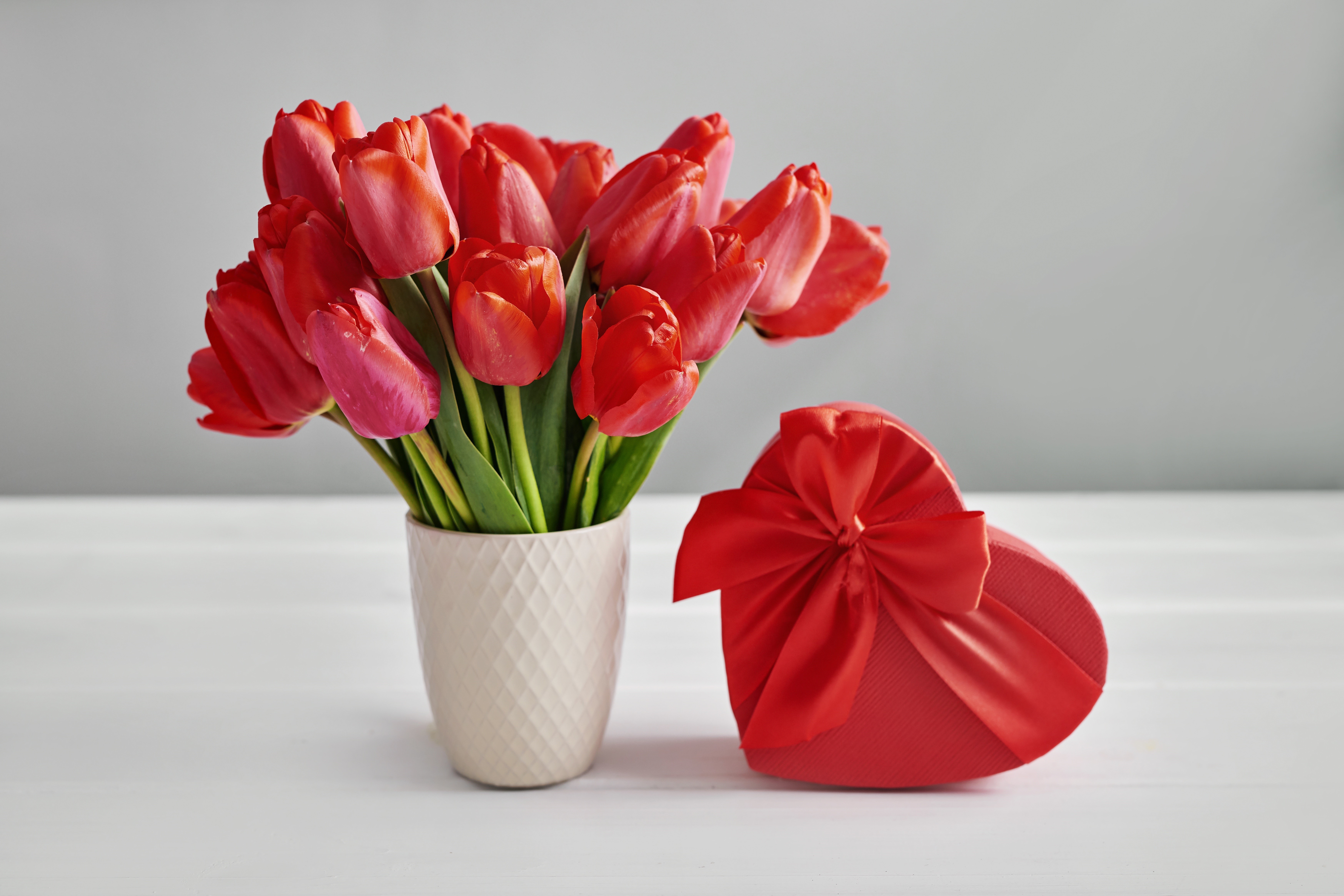 Red Tulips in a Vase with a Heart-Shaped Gift Box HD Wallpaper