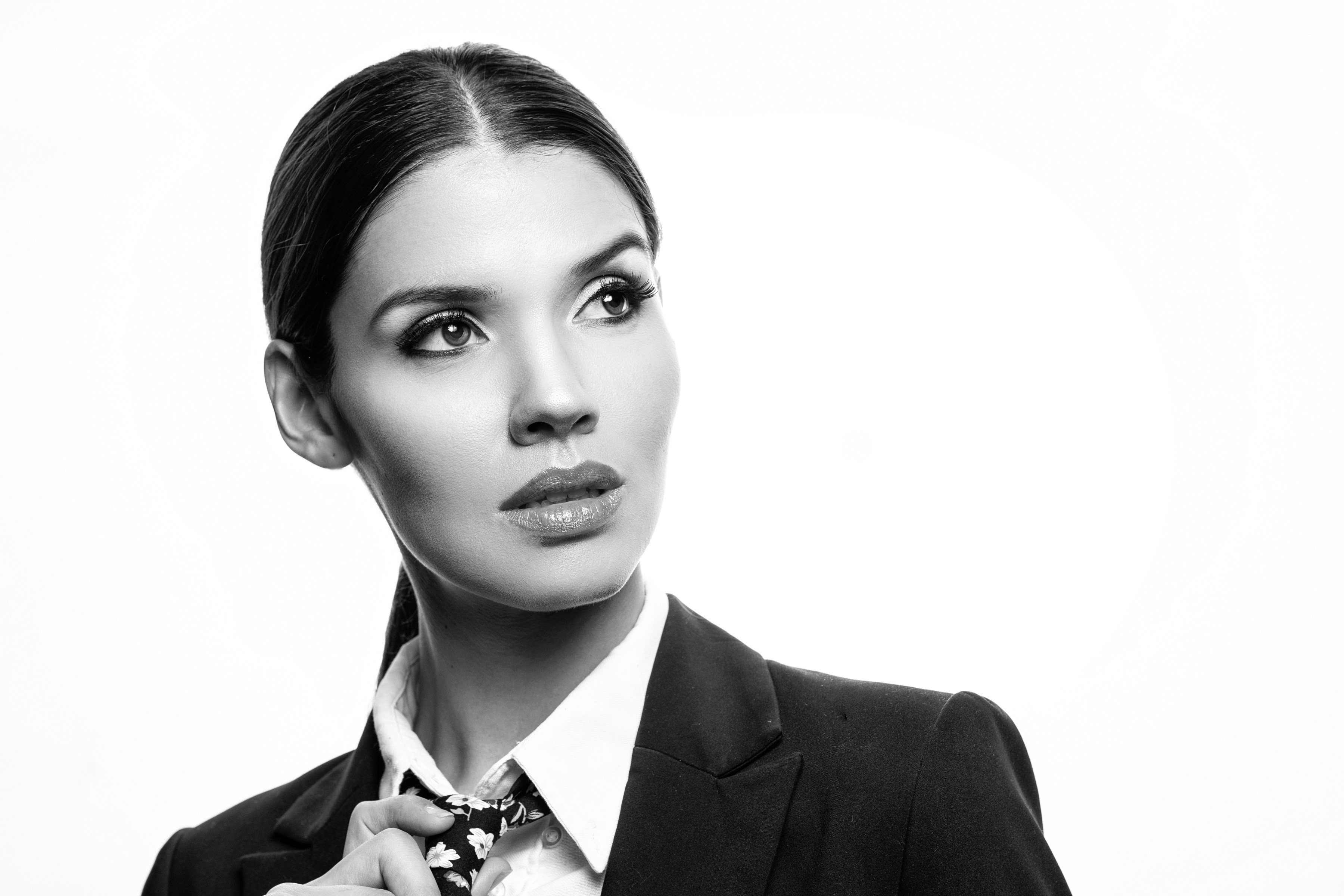 Karol, a brunette woman in a suit HD Wallpaper