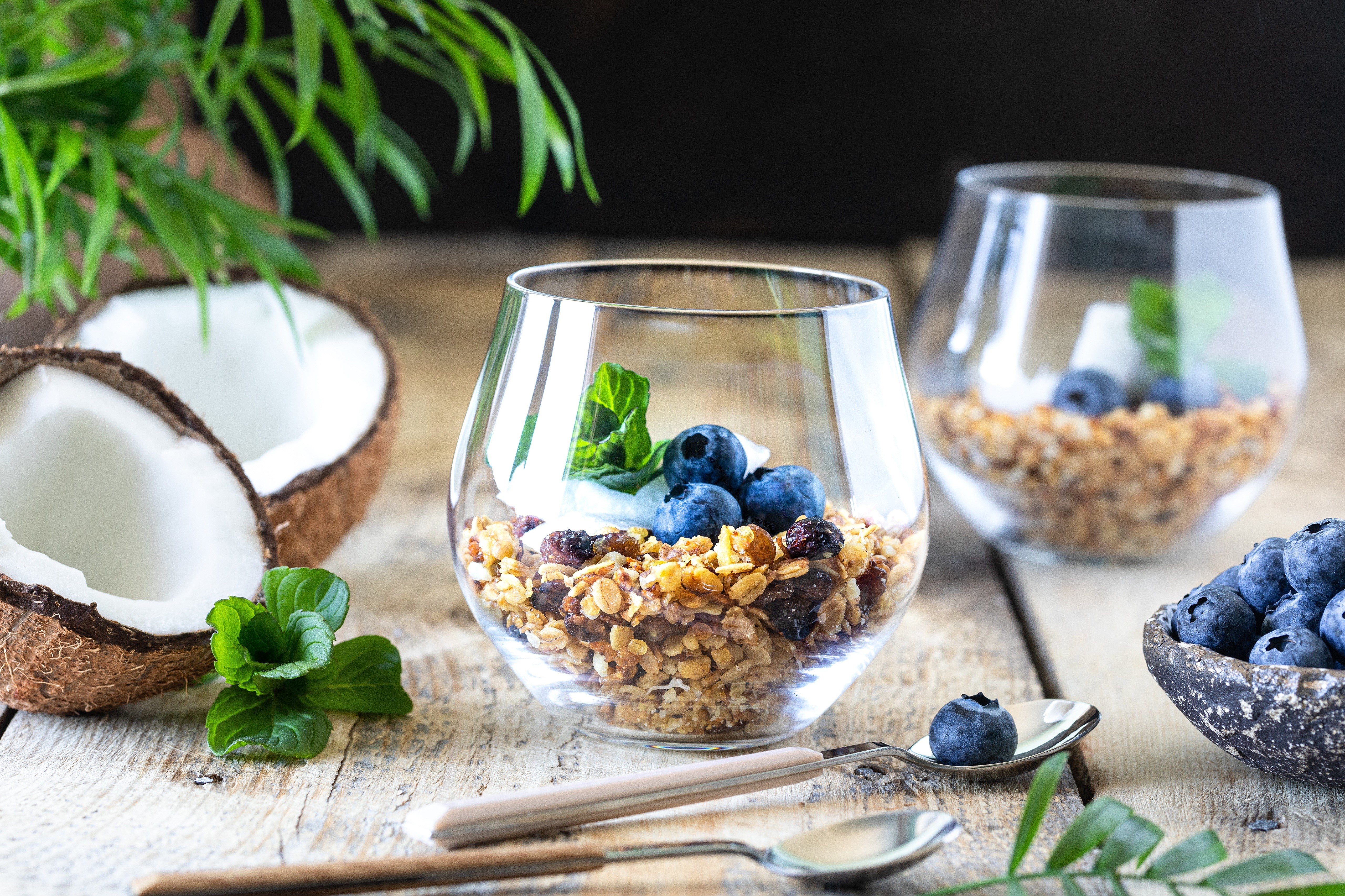 Muesli with blueberries and coconut in glasses HD Wallpaper