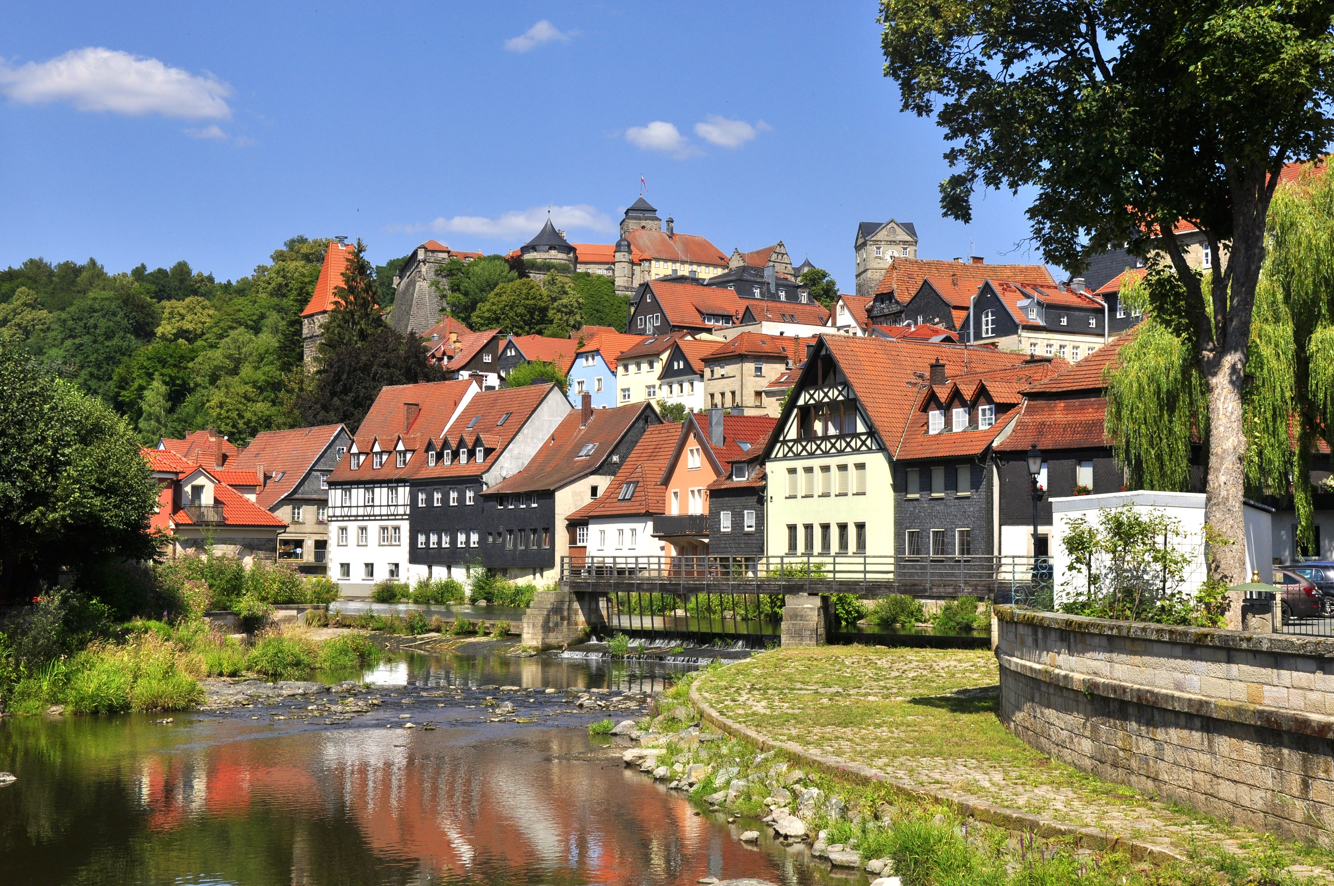 Kronach, Germany: River and Houses with Castle on Hill HD Wallpaper
