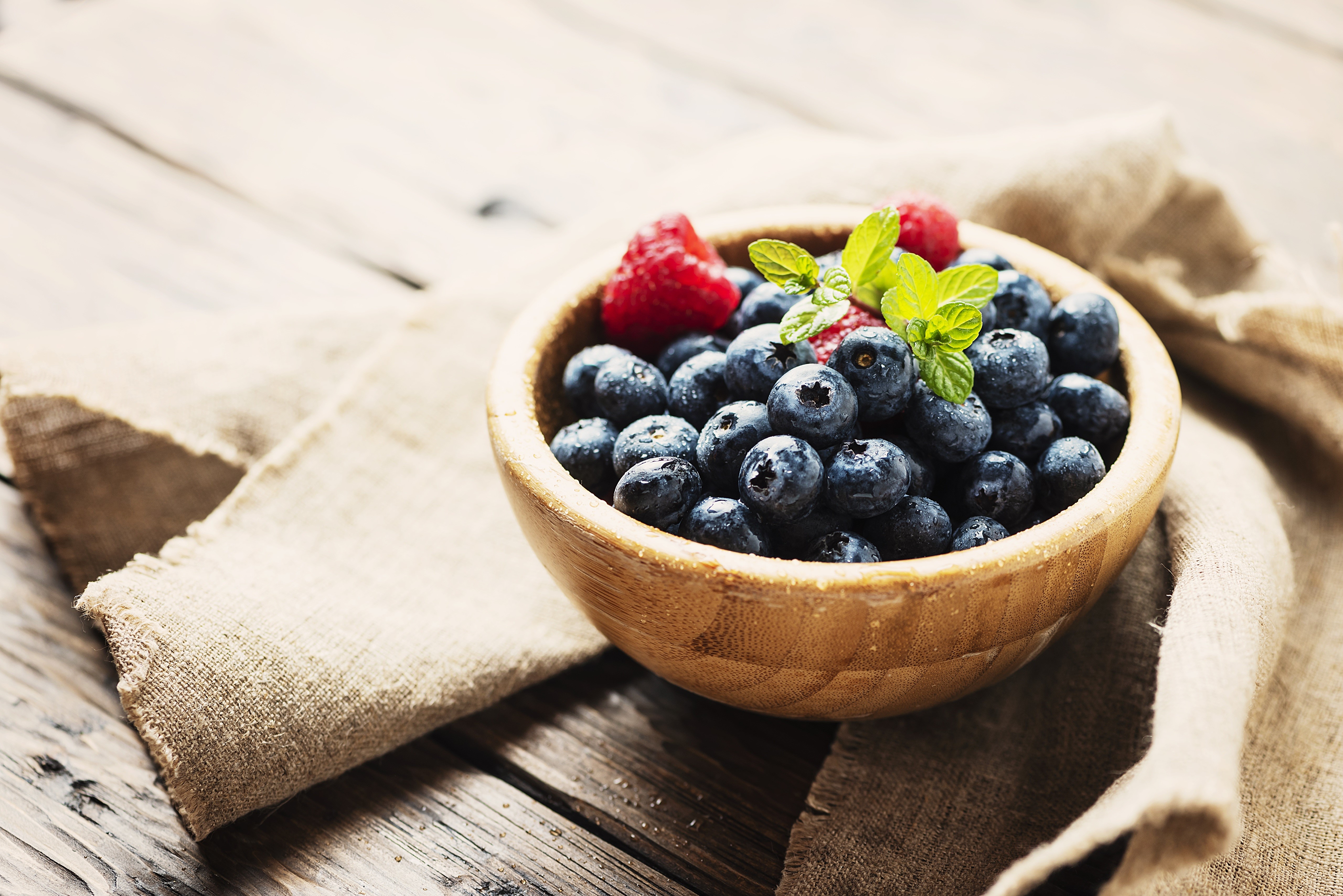 Blueberries and Strawberries in a Wooden Bowl HD Wallpaper