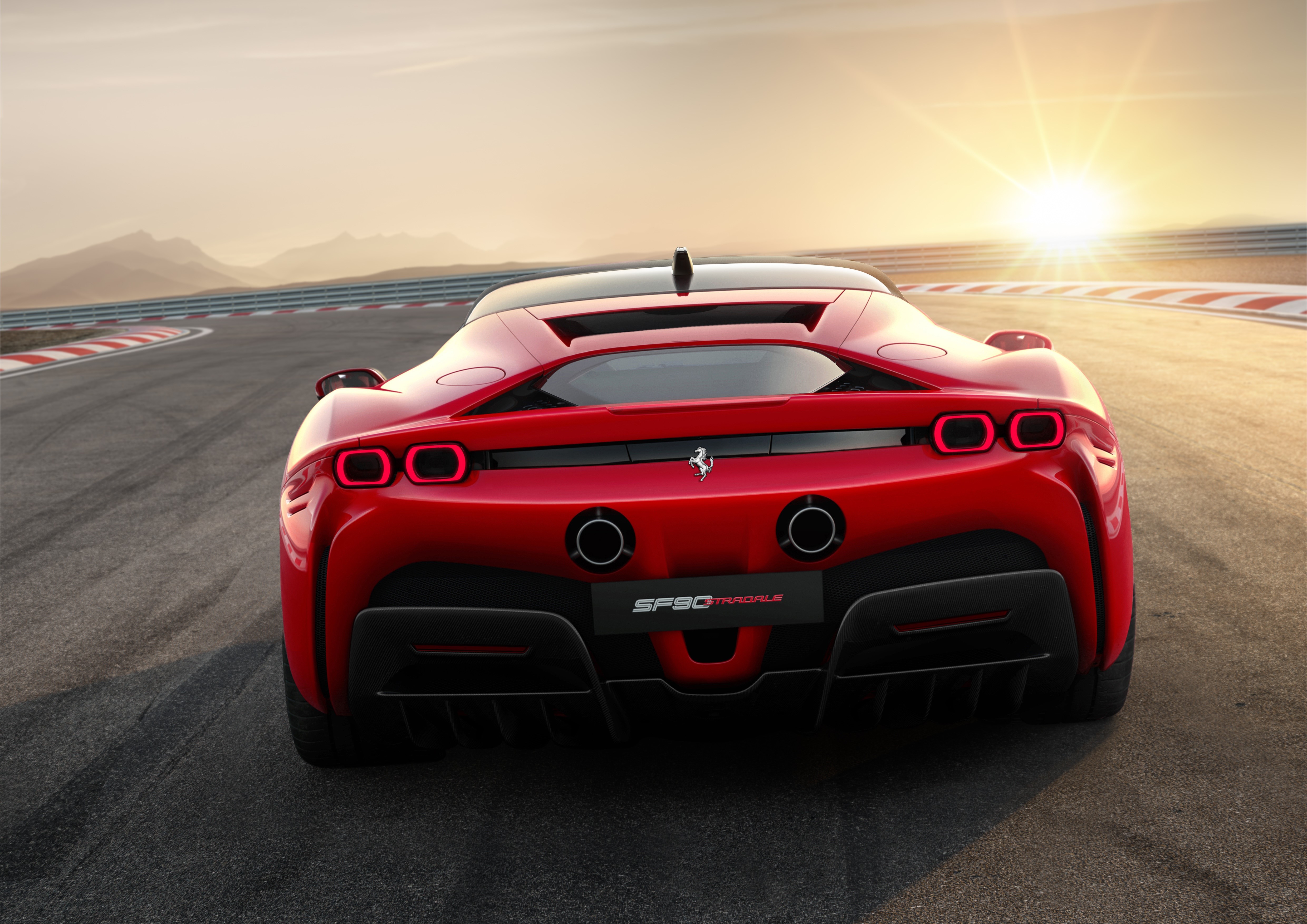 Ferrari SF90 Stradale on a race track HD Wallpaper