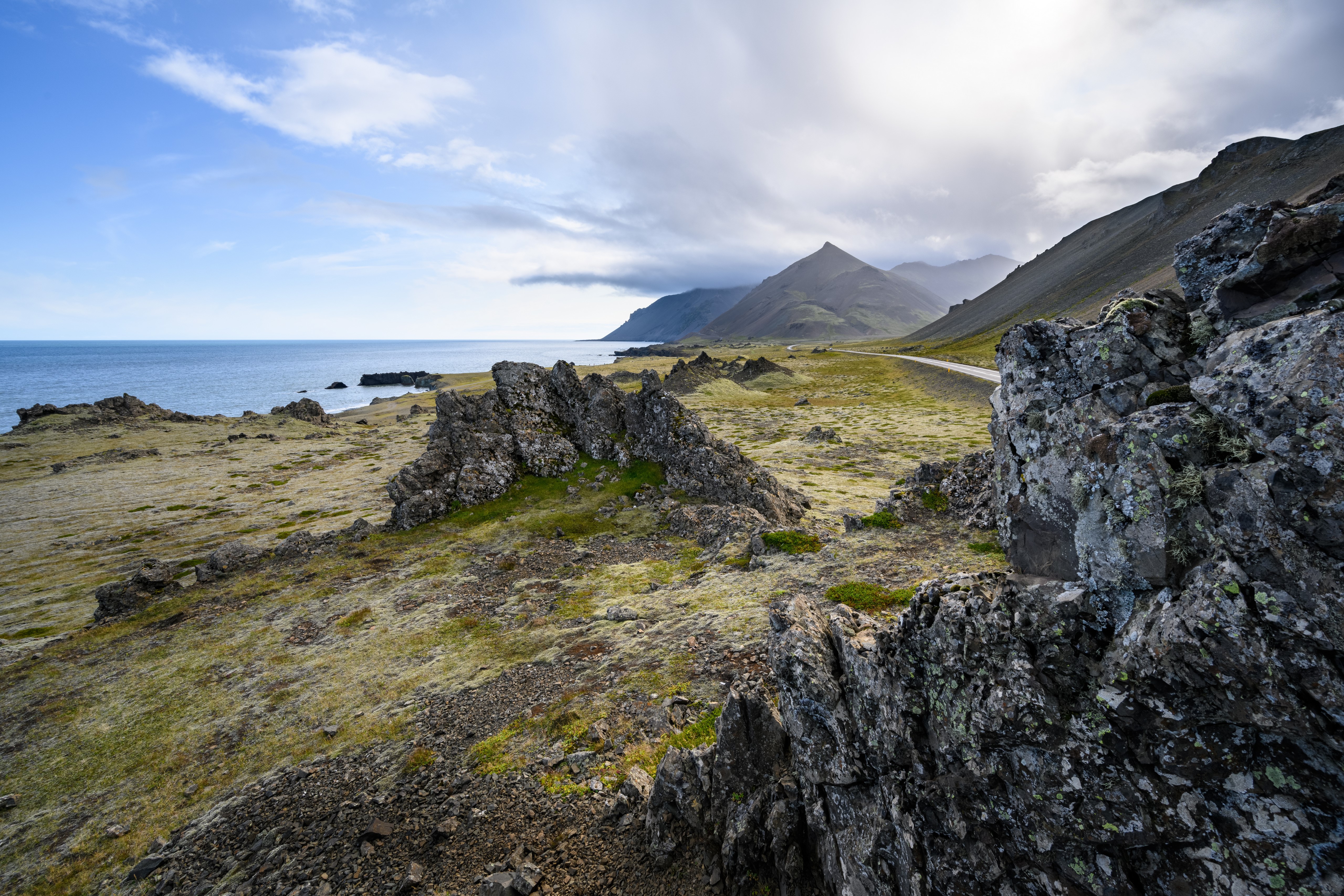 Icelandic Coastline with Mountains and Rocky Shore HD Wallpaper