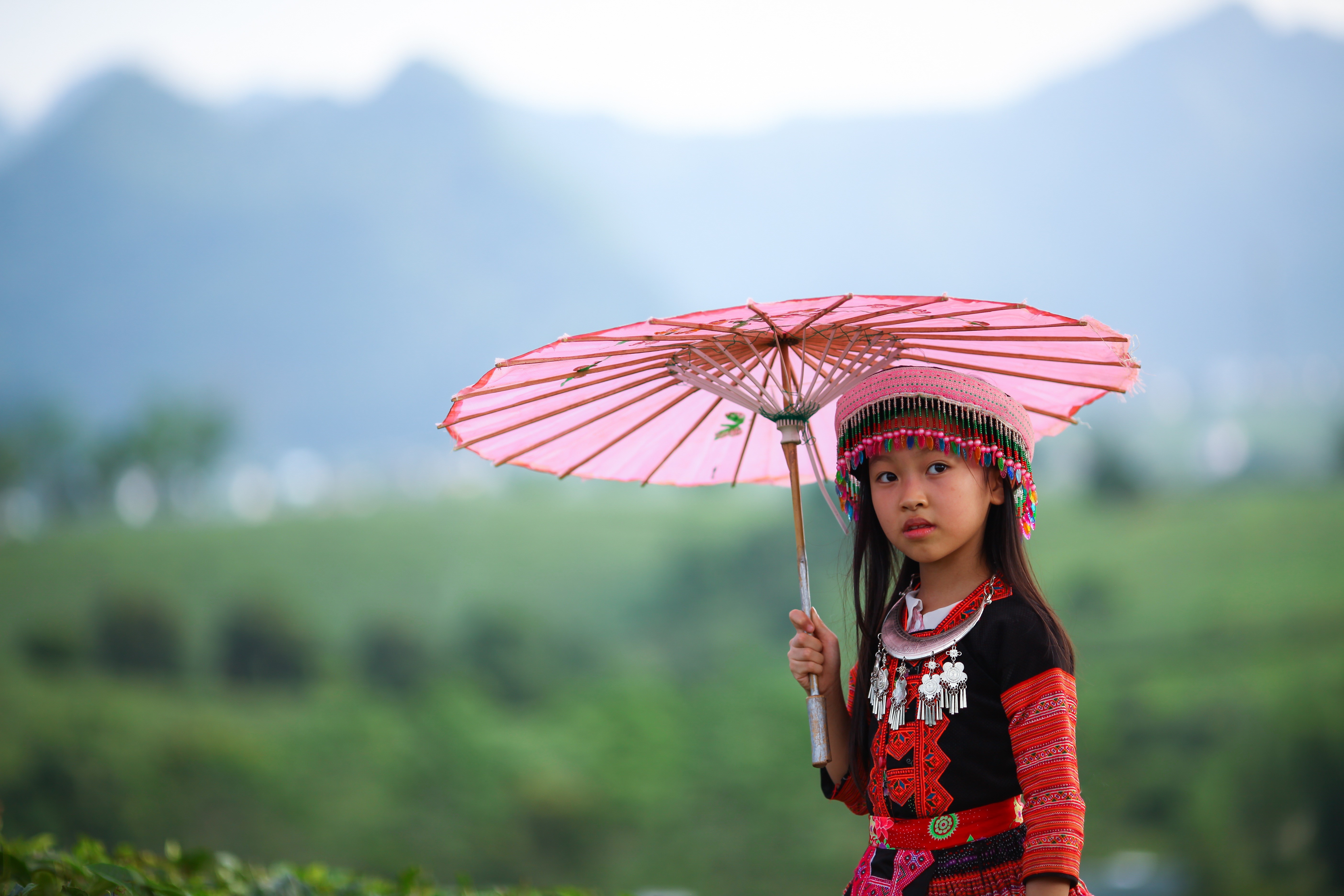 Girl in traditional clothing holding a pink umbrella HD Wallpaper