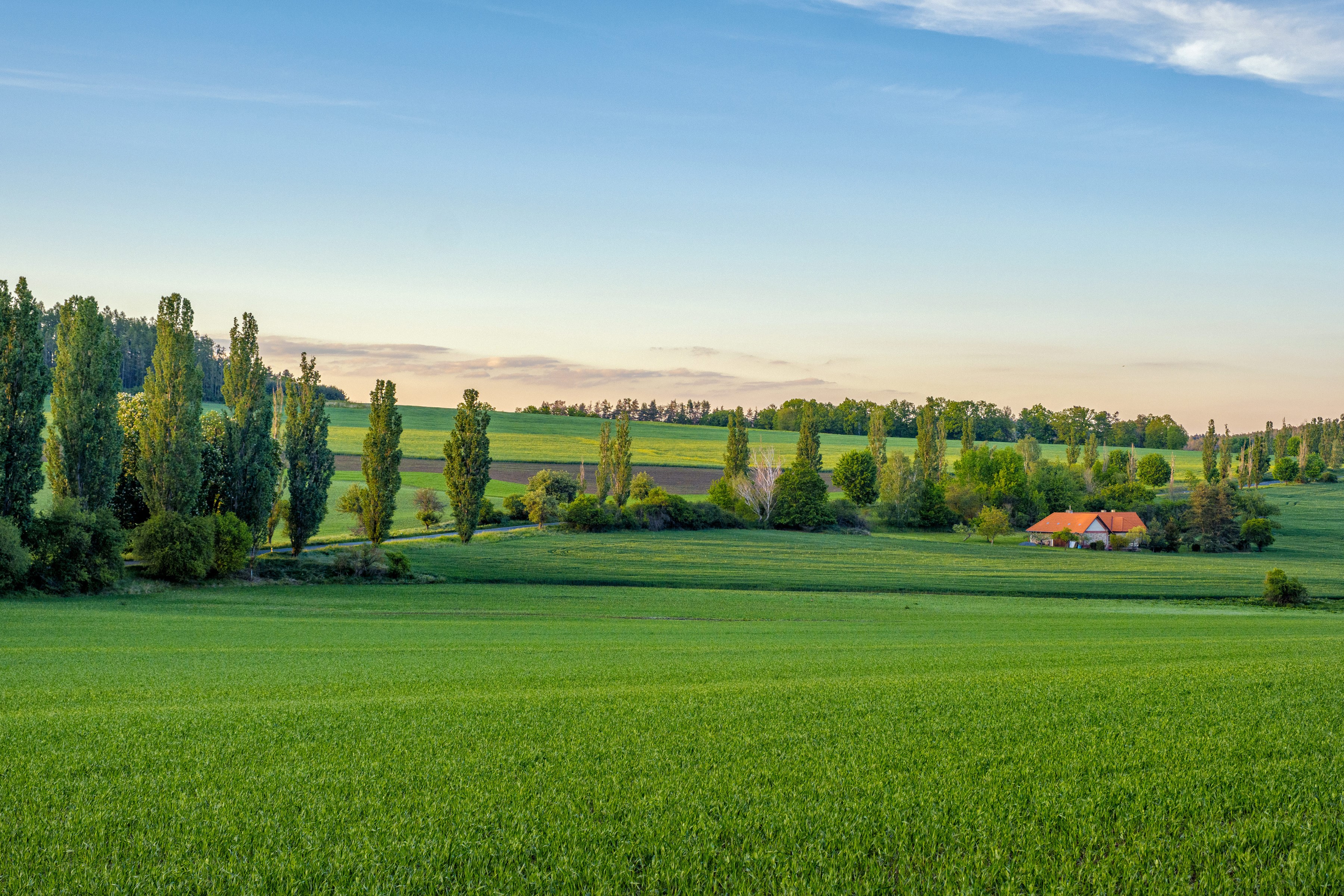 Bohemian landscape with fields and houses in Czech Republic HD Wallpaper
