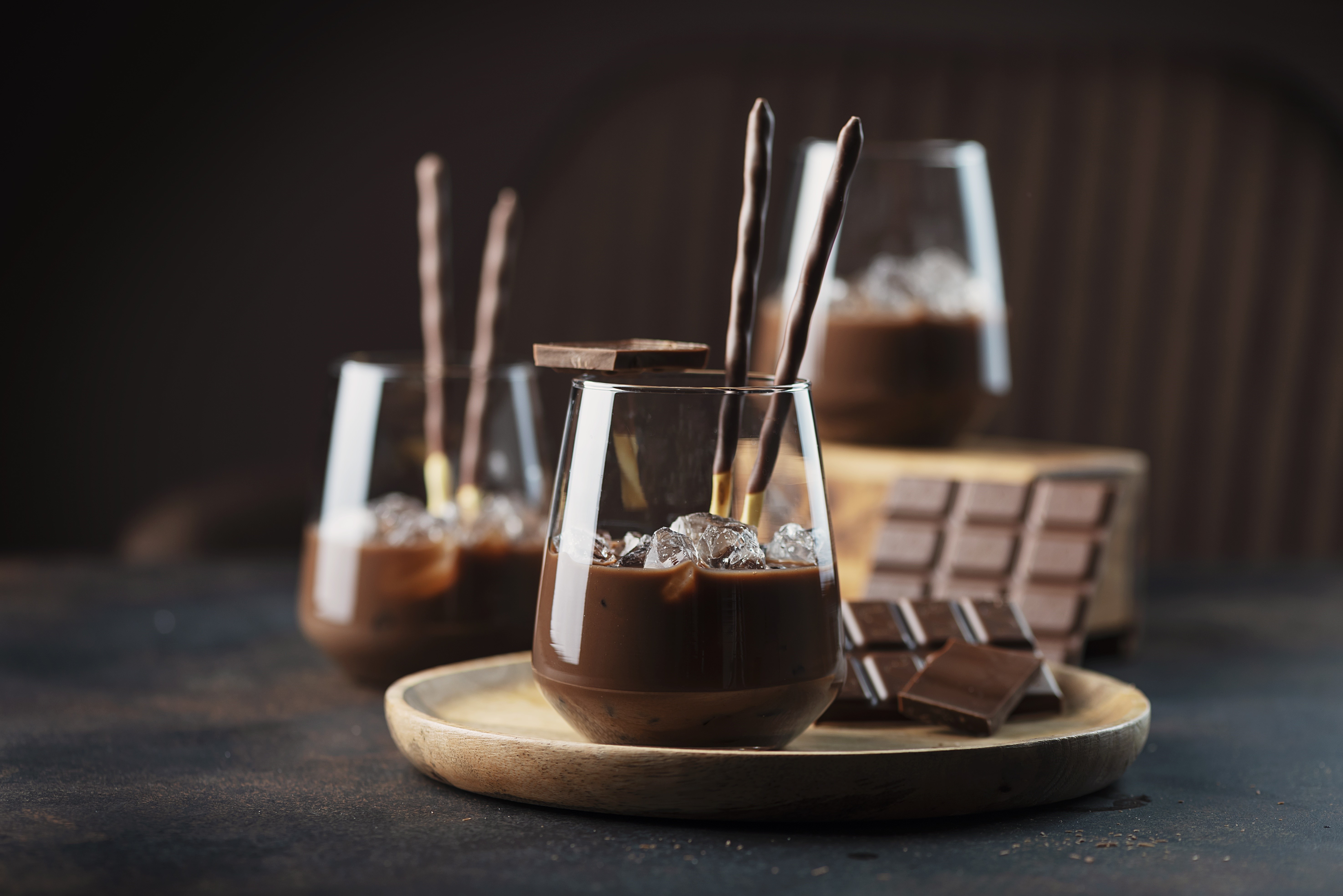 Chocolate drinks with chocolate sticks and ice HD Wallpaper