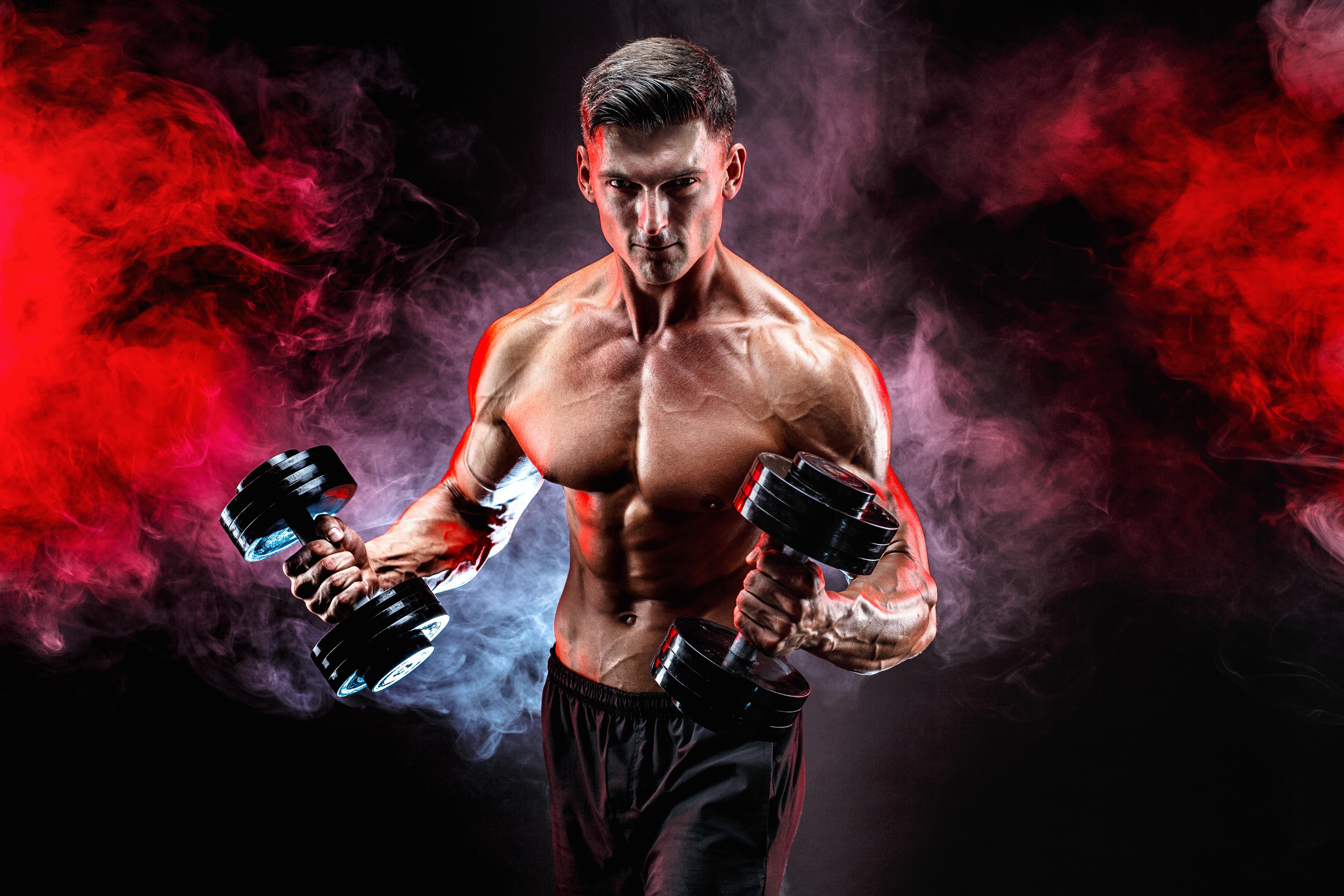 Man with dumbbells and red smoke HD Wallpaper
