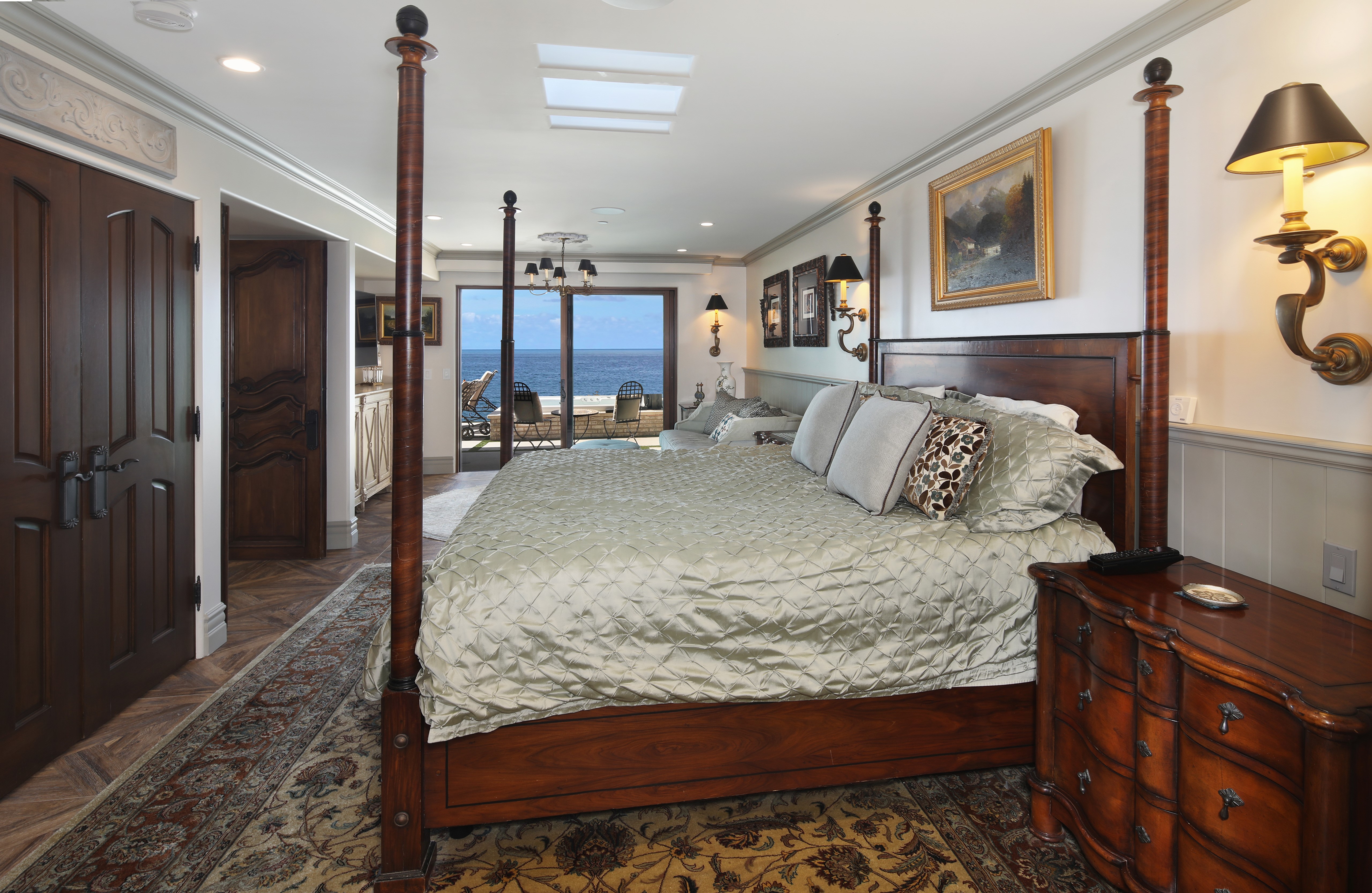 Bedroom with four-poster bed and ocean view HD Wallpaper