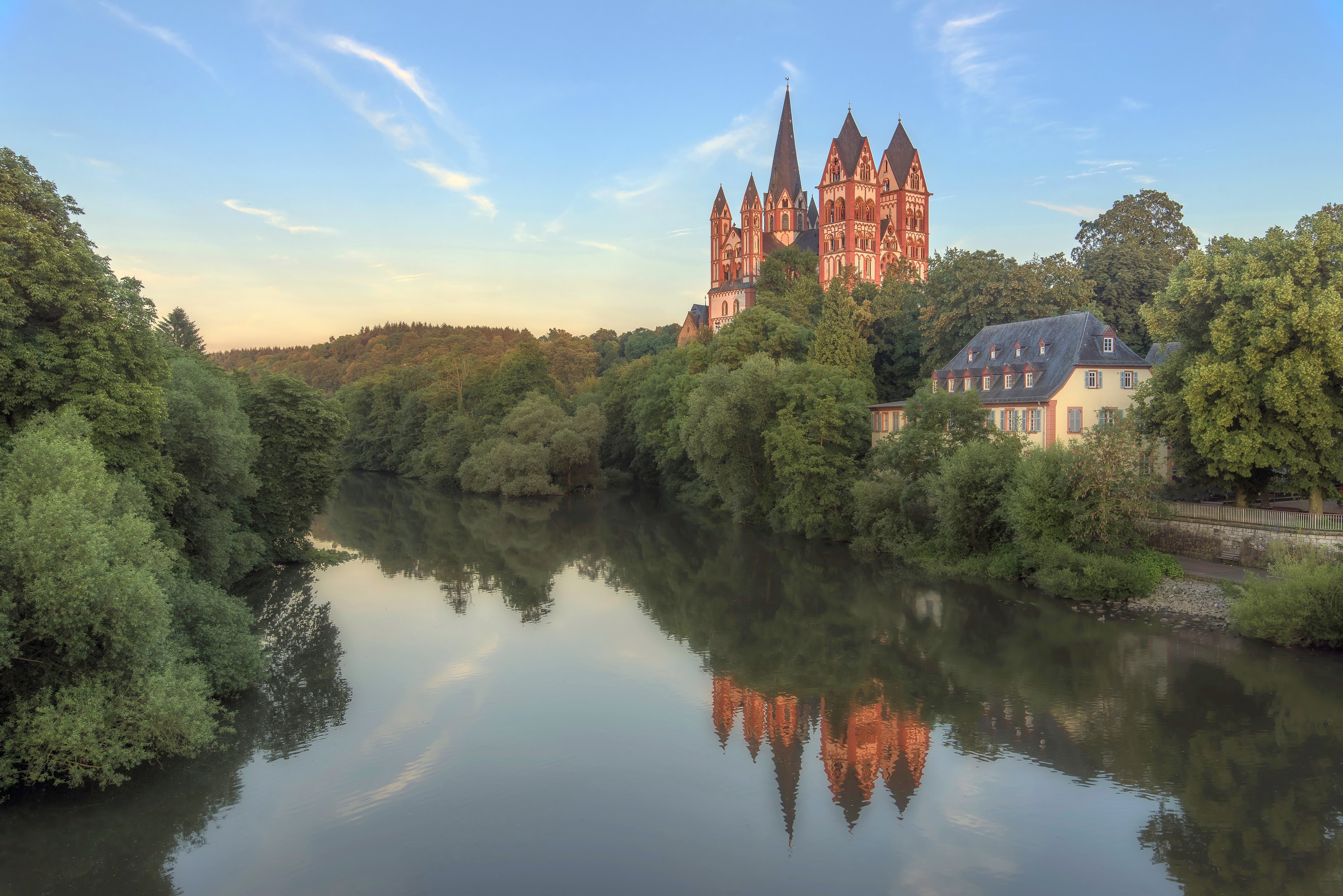 Limburg Cathedral reflected in a river in Germany HD Wallpaper