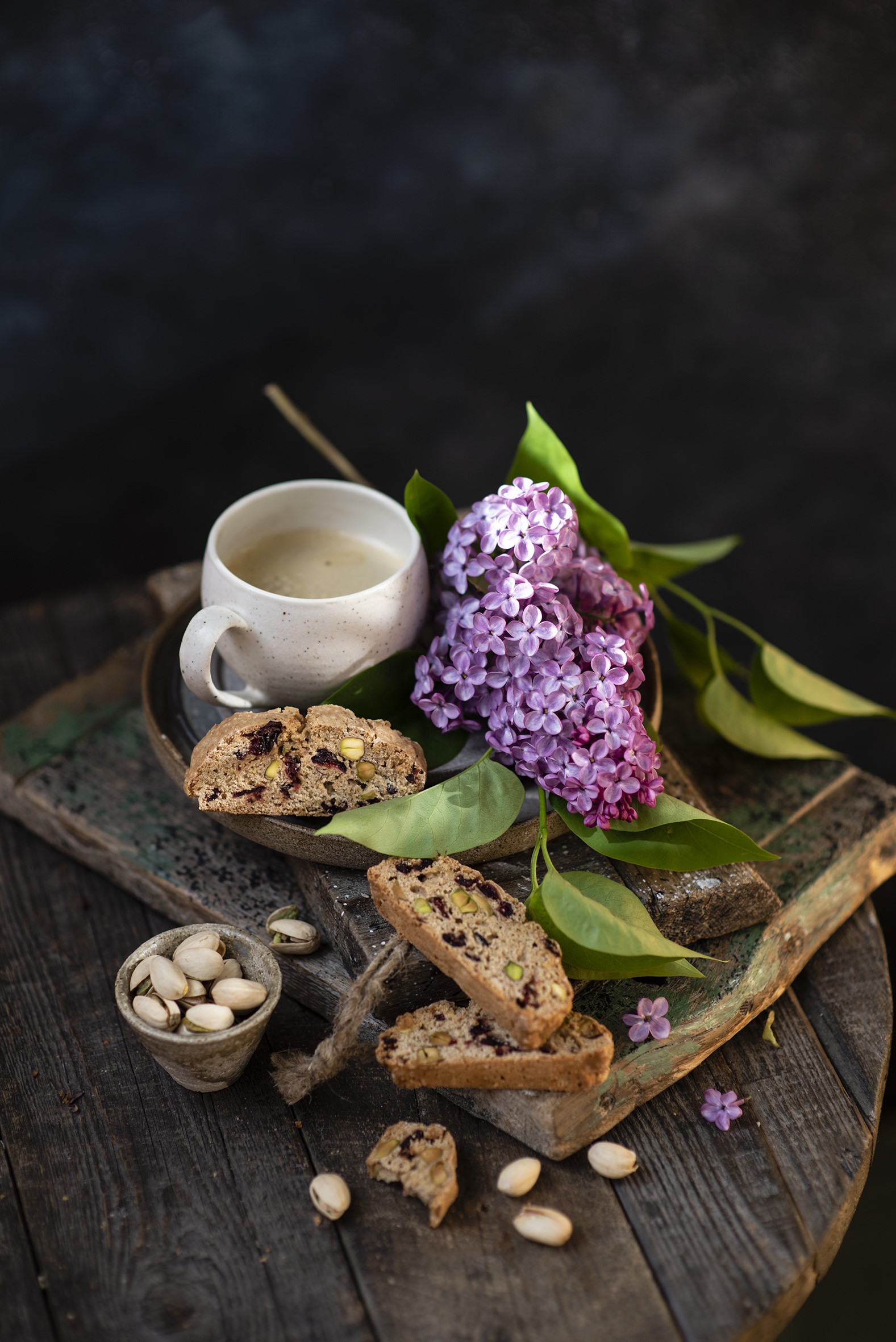 Coffee, Biscotti, Pistachios, and Lilacs on Wood HD Phone Wallpaper