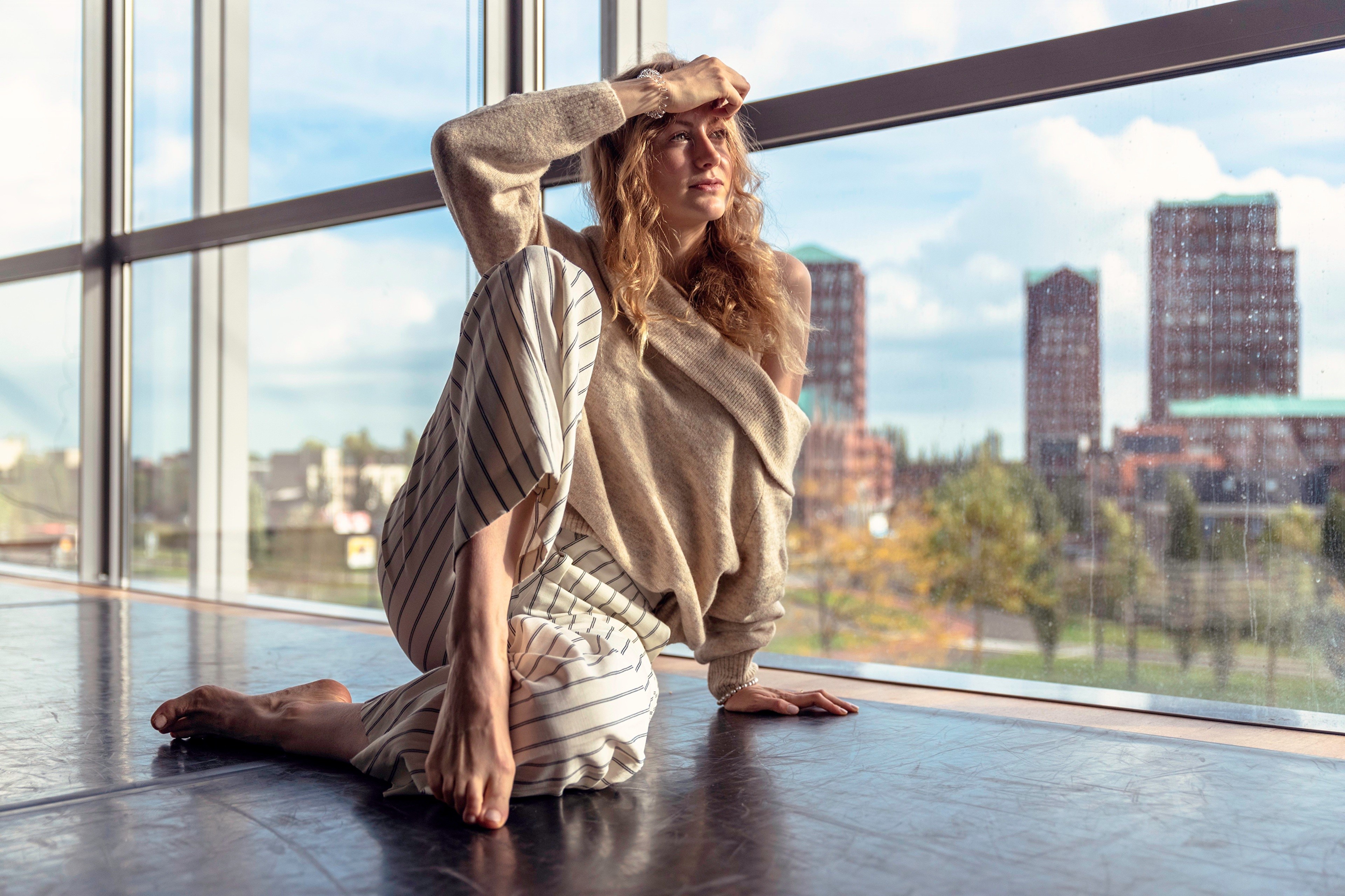 Eline Goris sitting by a window HD Wallpaper