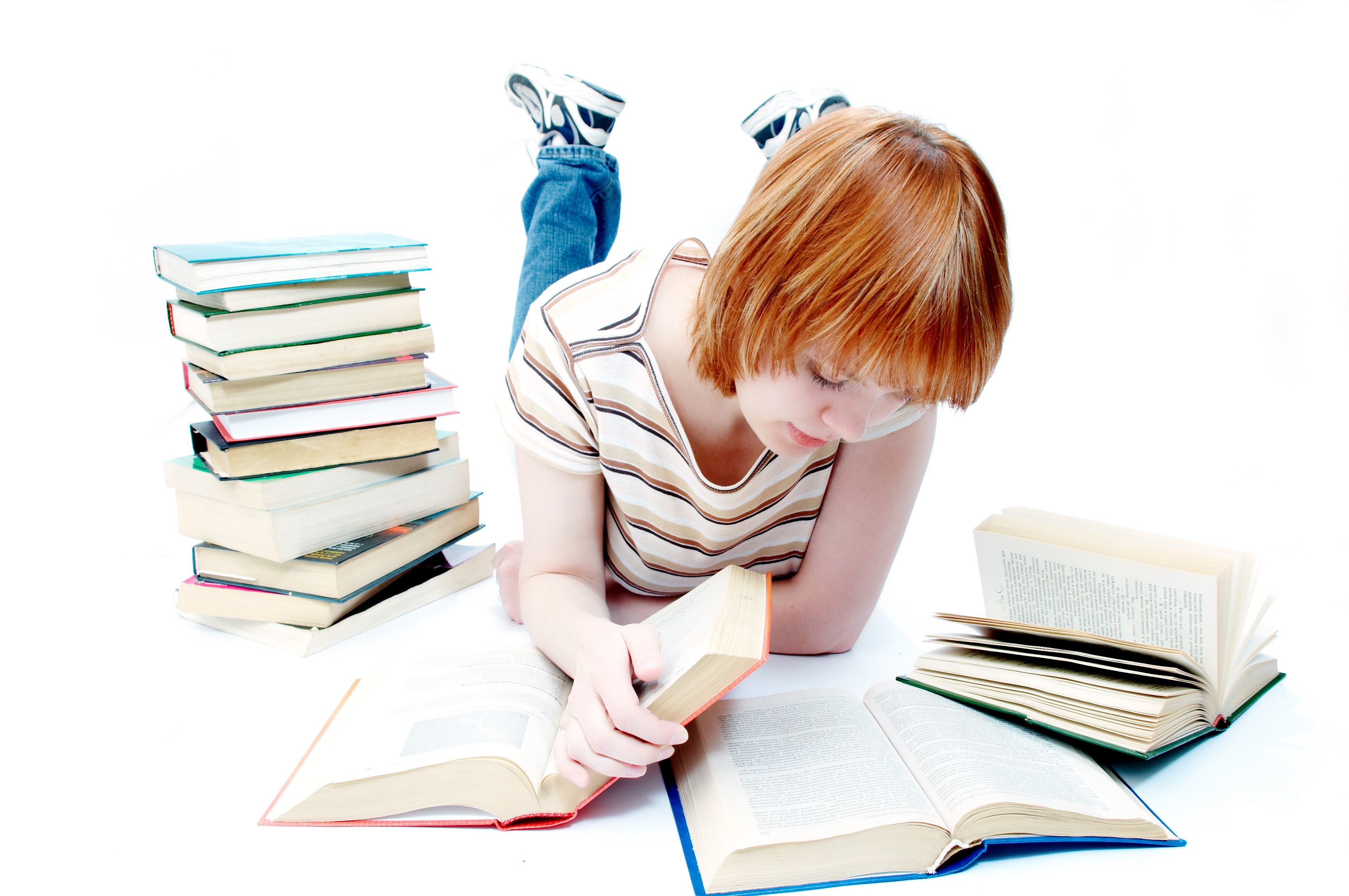 Redhead girl reading books on white background HD Wallpaper