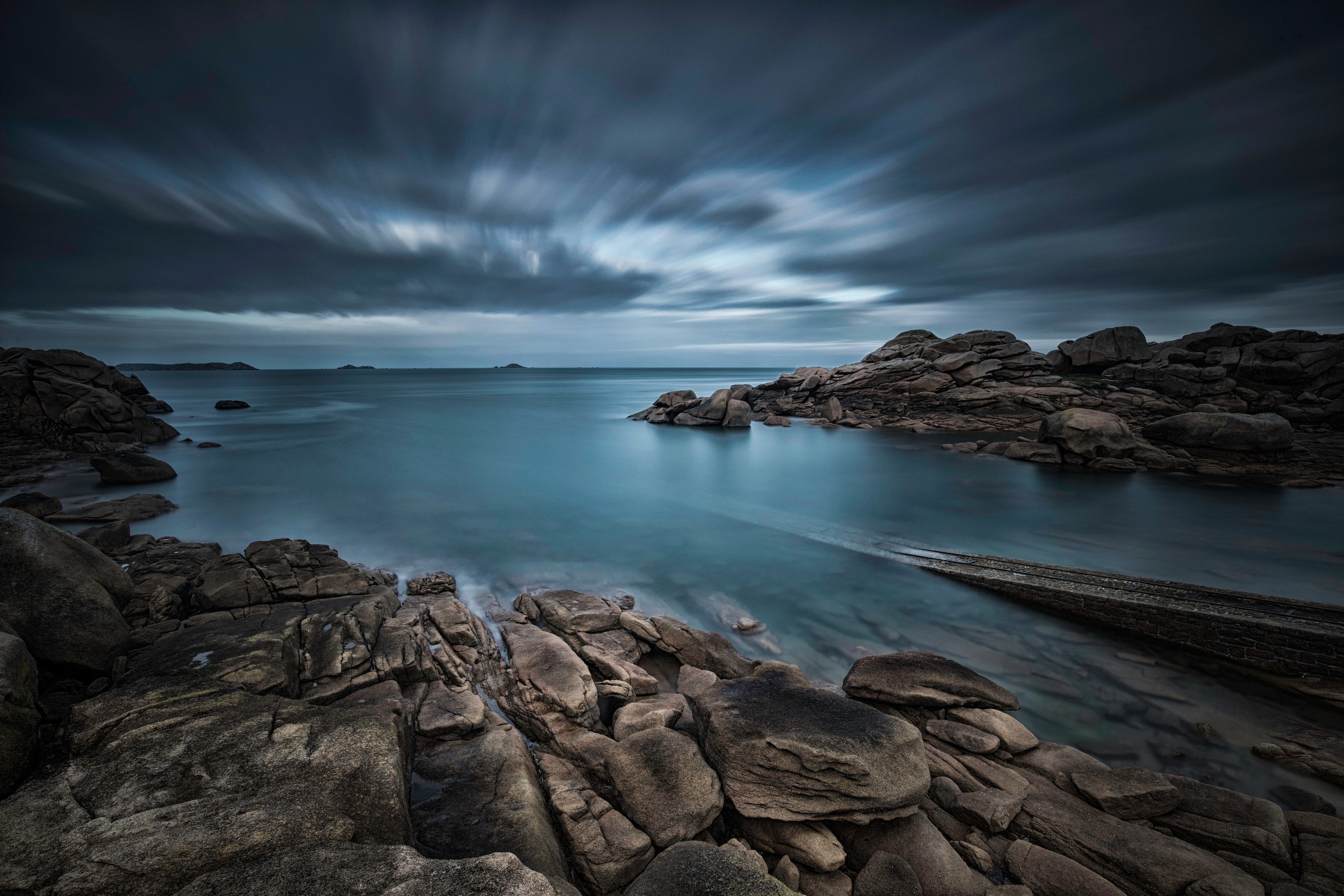 Evening on the rocky coast of Ploumanac'h, France HD Wallpaper