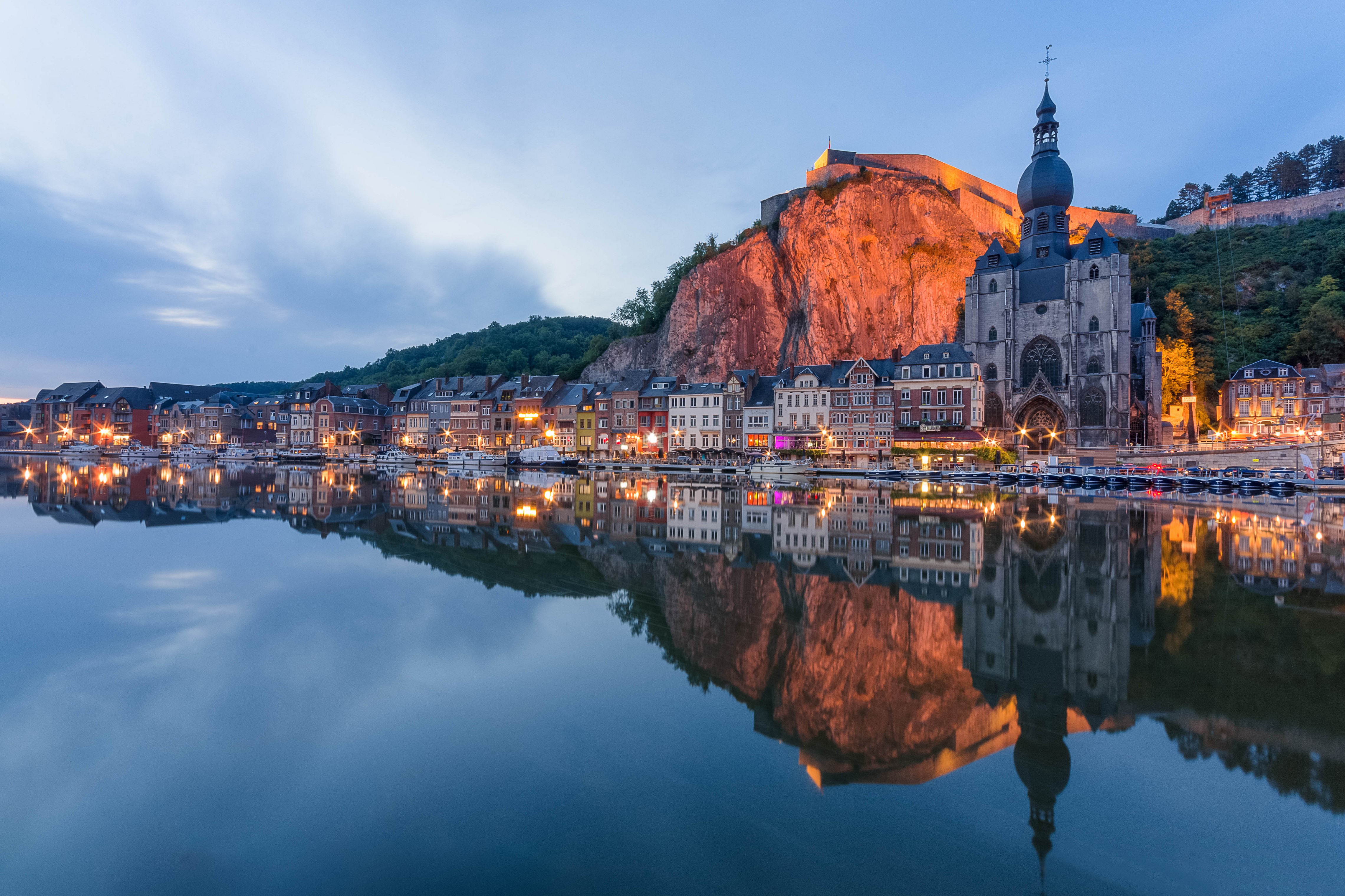 Dinant cityscape with river reflection at dusk HD Wallpaper
