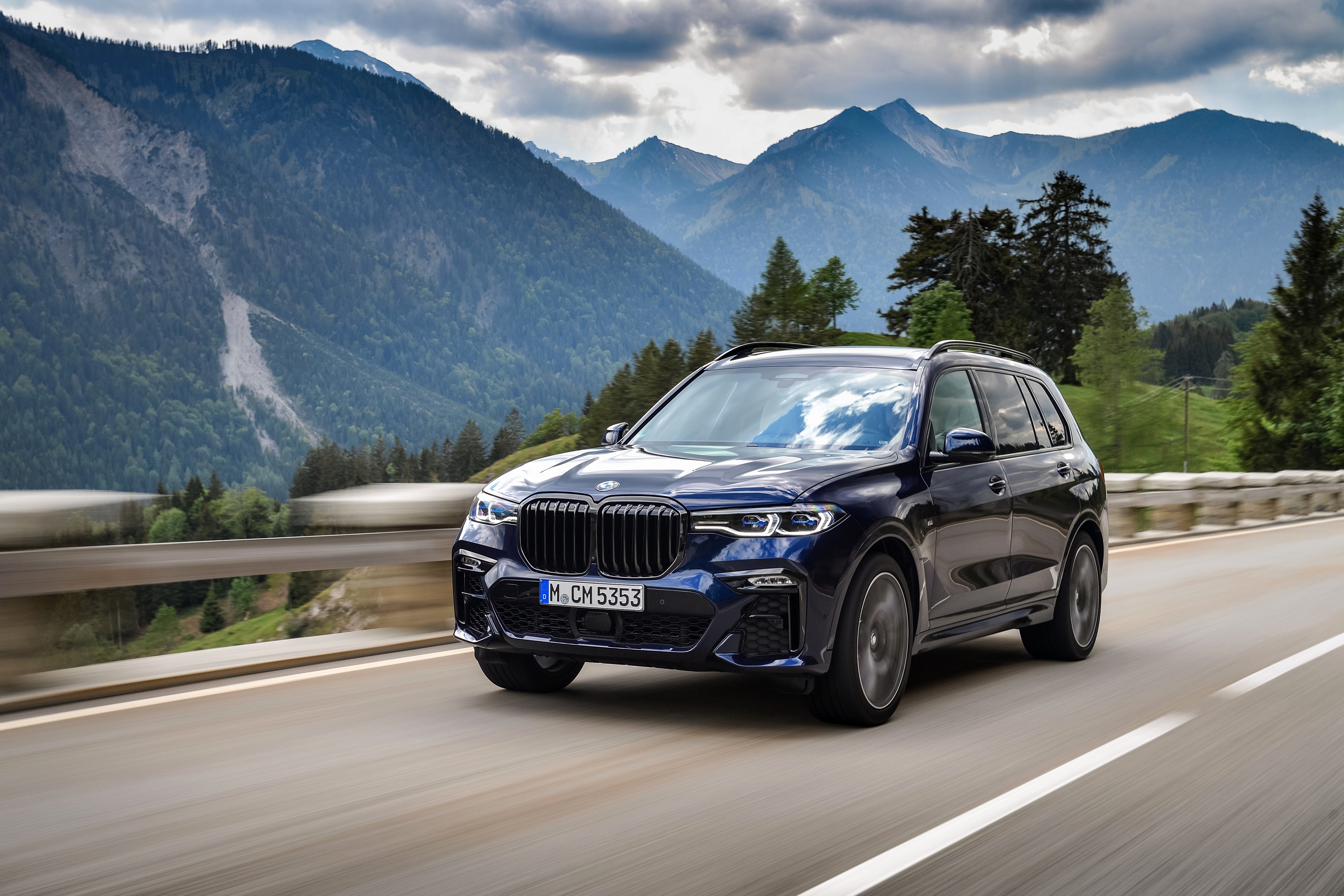 BMW X7 G07 driving on a mountain road HD Wallpaper