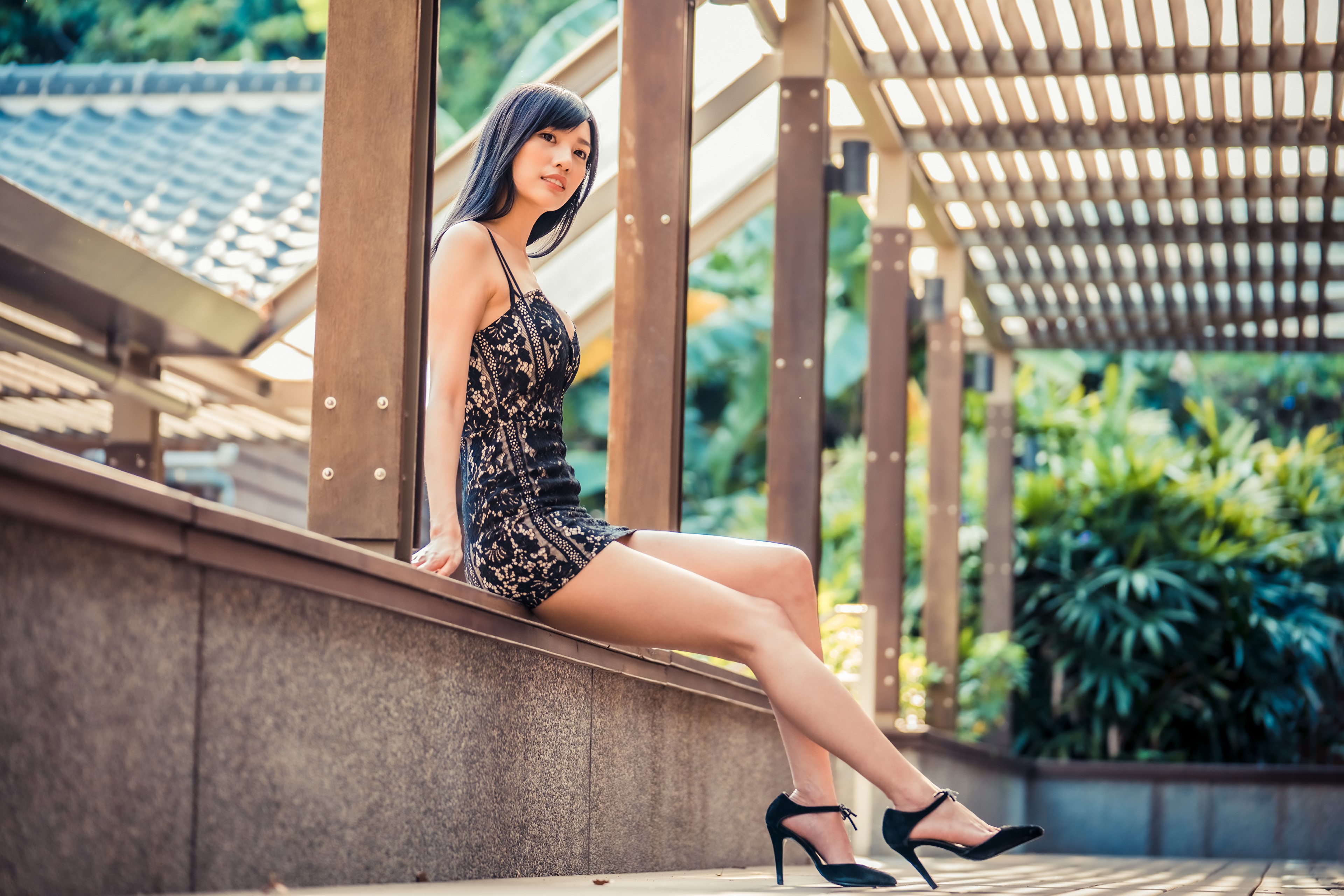 4K Asian Woman Sitting in Stylish Dress HD Wallpaper
