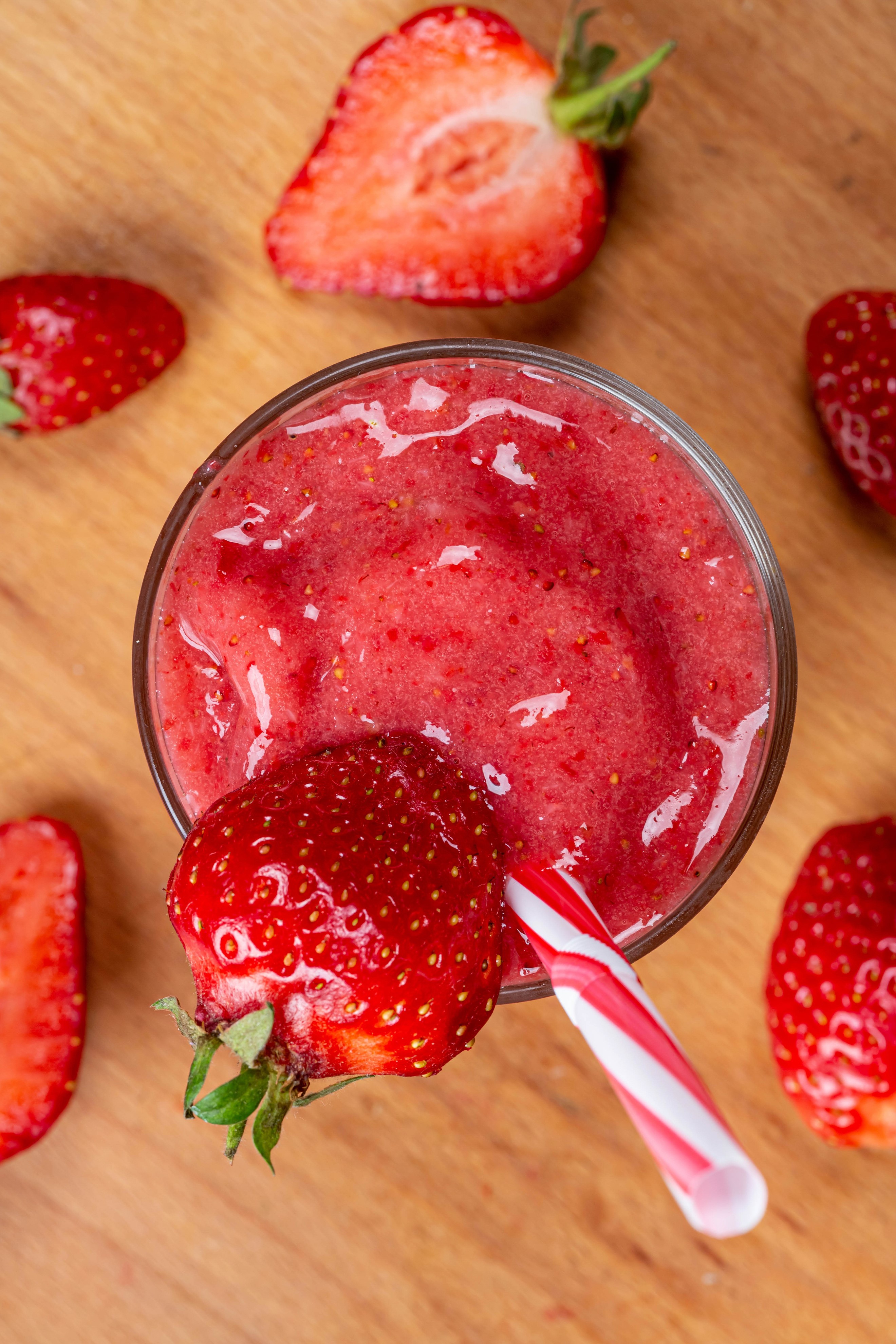Strawberry smoothie in a glass with strawberries HD Phone Wallpaper