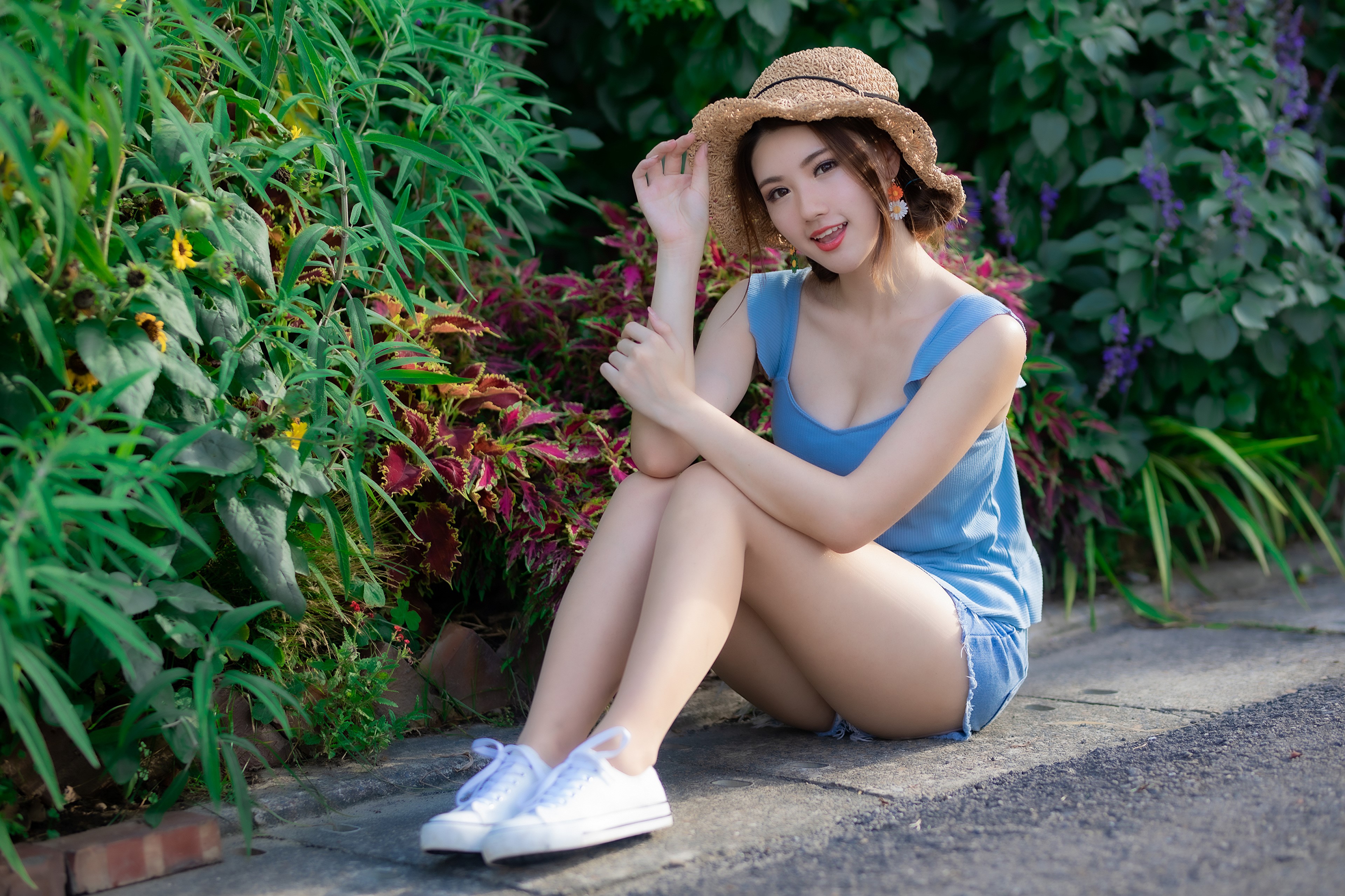 4K Asian Woman Sitting in Shorts and Hat HD Wallpaper