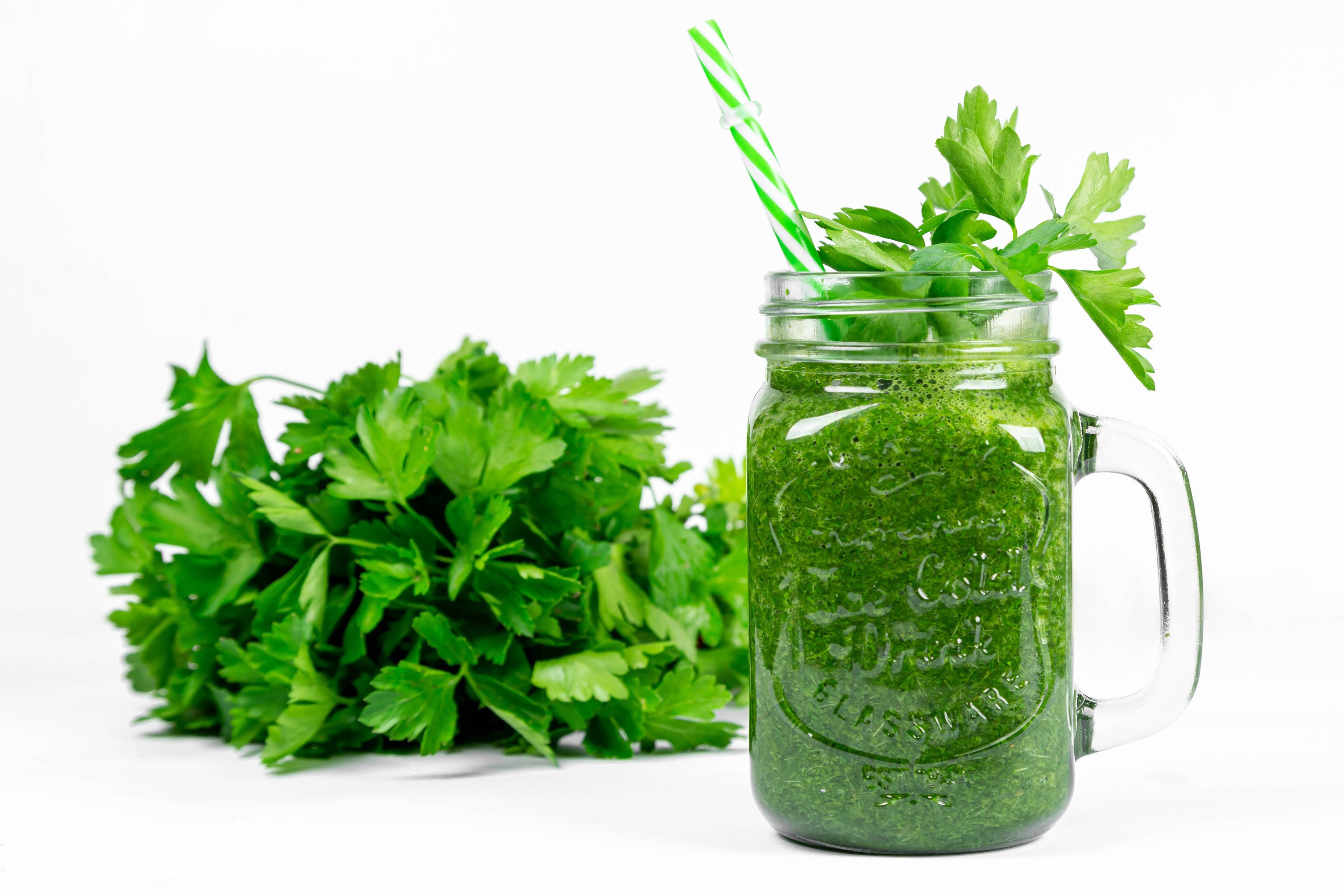 Parsley smoothie in a mason jar with fresh parsley HD Wallpaper