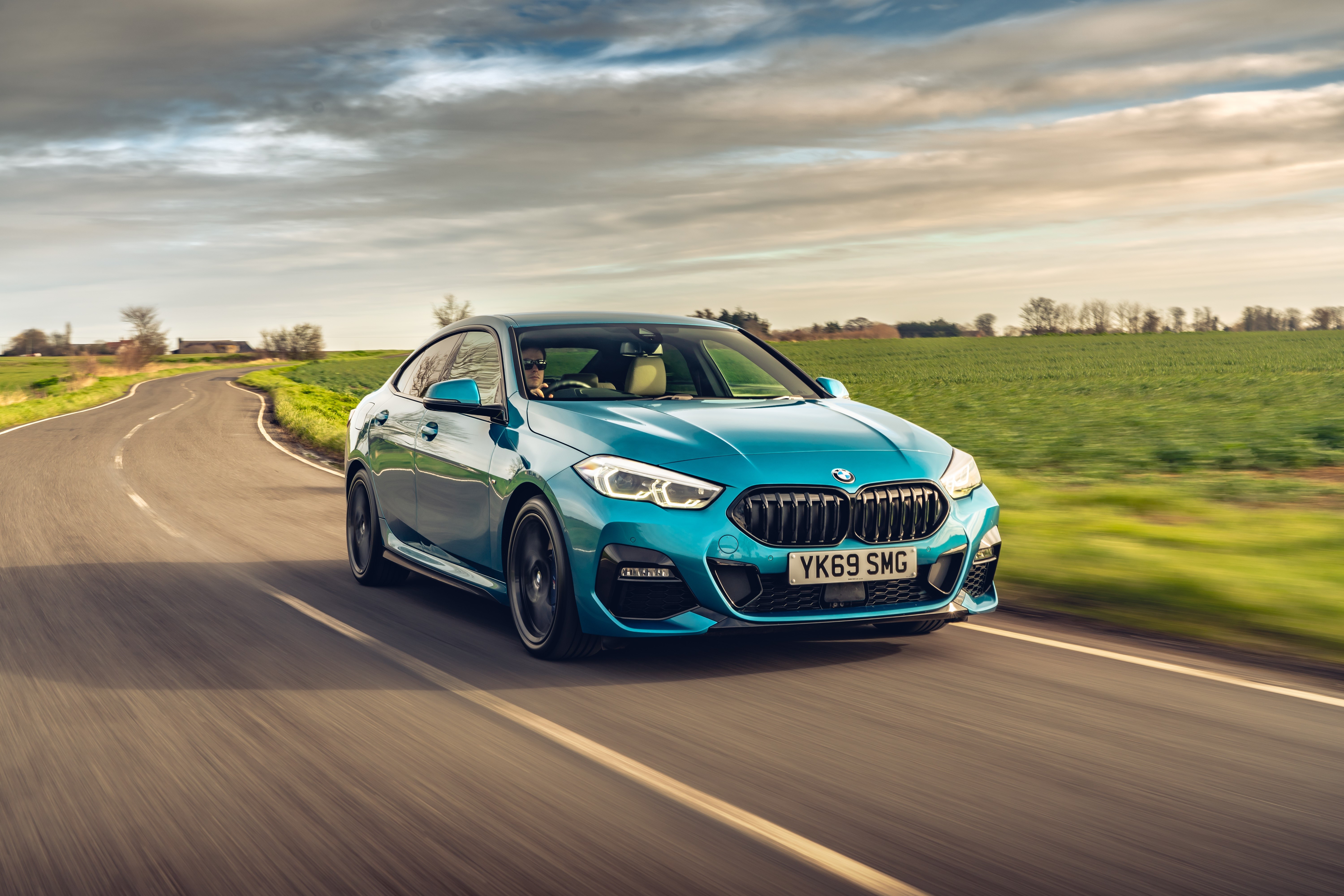 2020 BMW 218i Grand Coupe on a Road HD Wallpaper