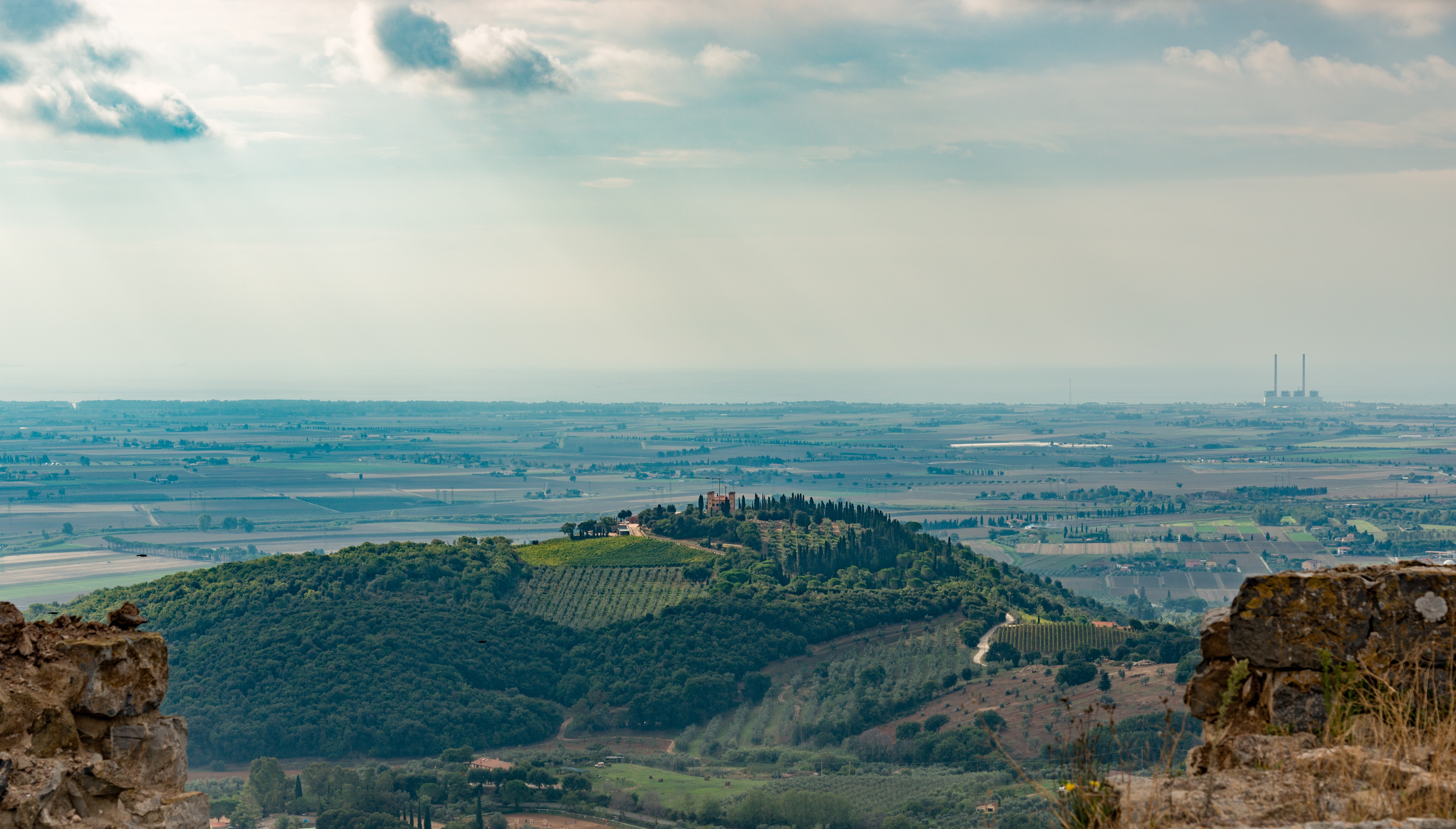 Tuscany landscape with power plant in the distance HD Wallpaper