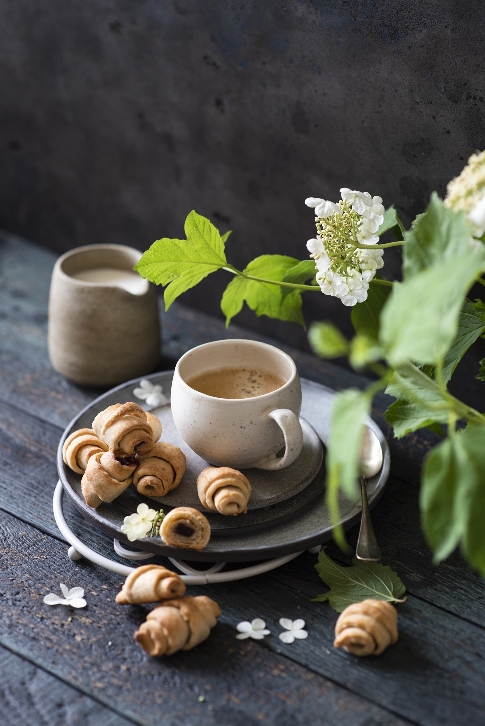 Coffee and croissants on a wooden table with flowers HD Phone Wallpaper